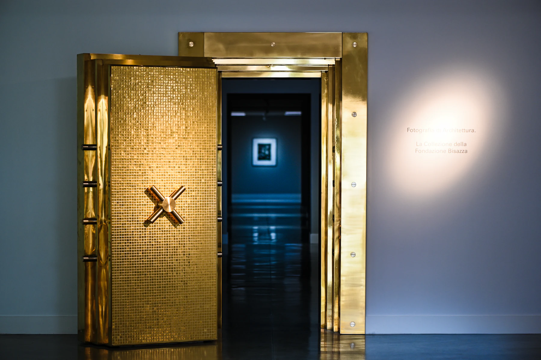 A bank vault door standing open.