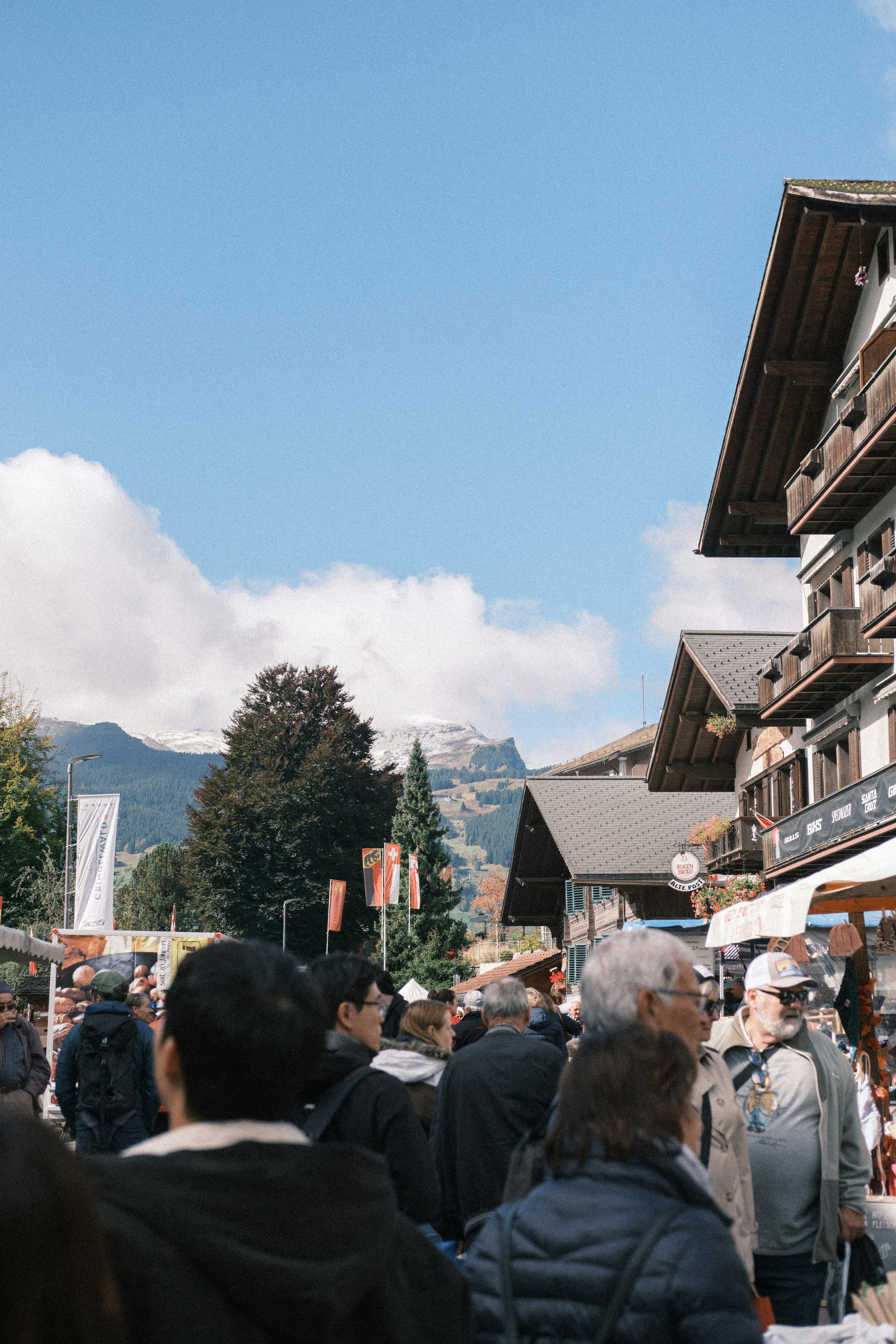 People gathered in a mountain village marketplace