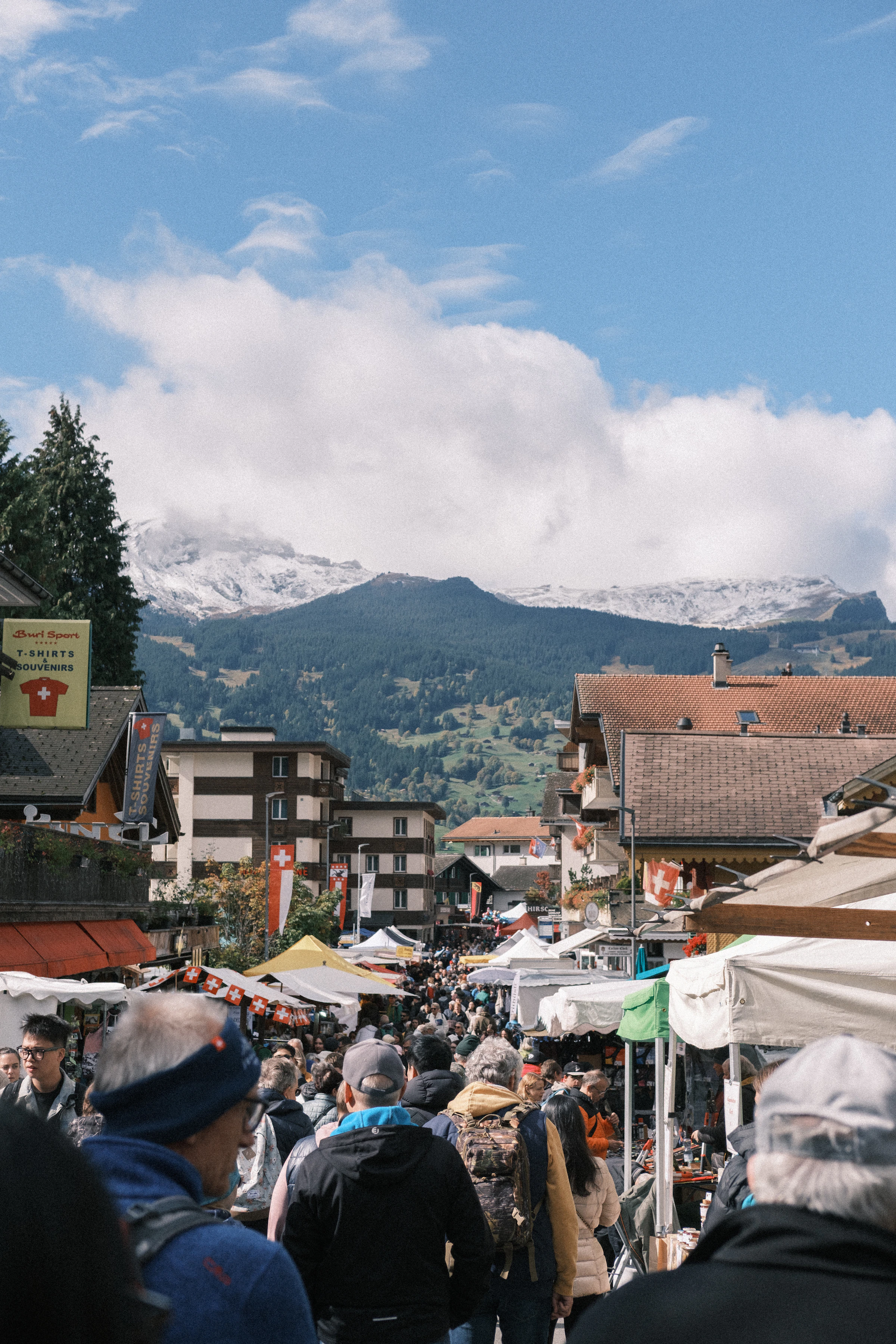 Travelers at an Alpine festival