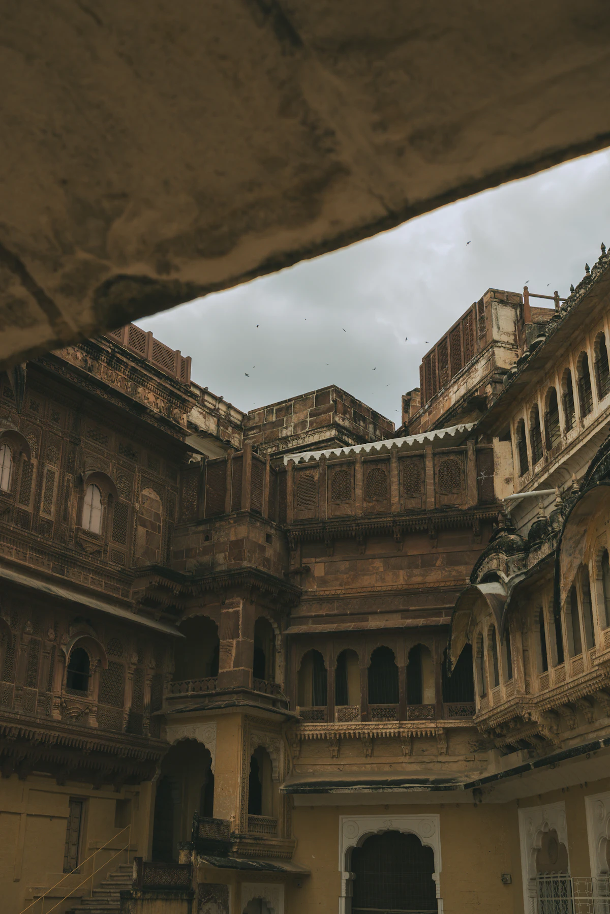 Carved sandstone palace courtyard in Rajasthan