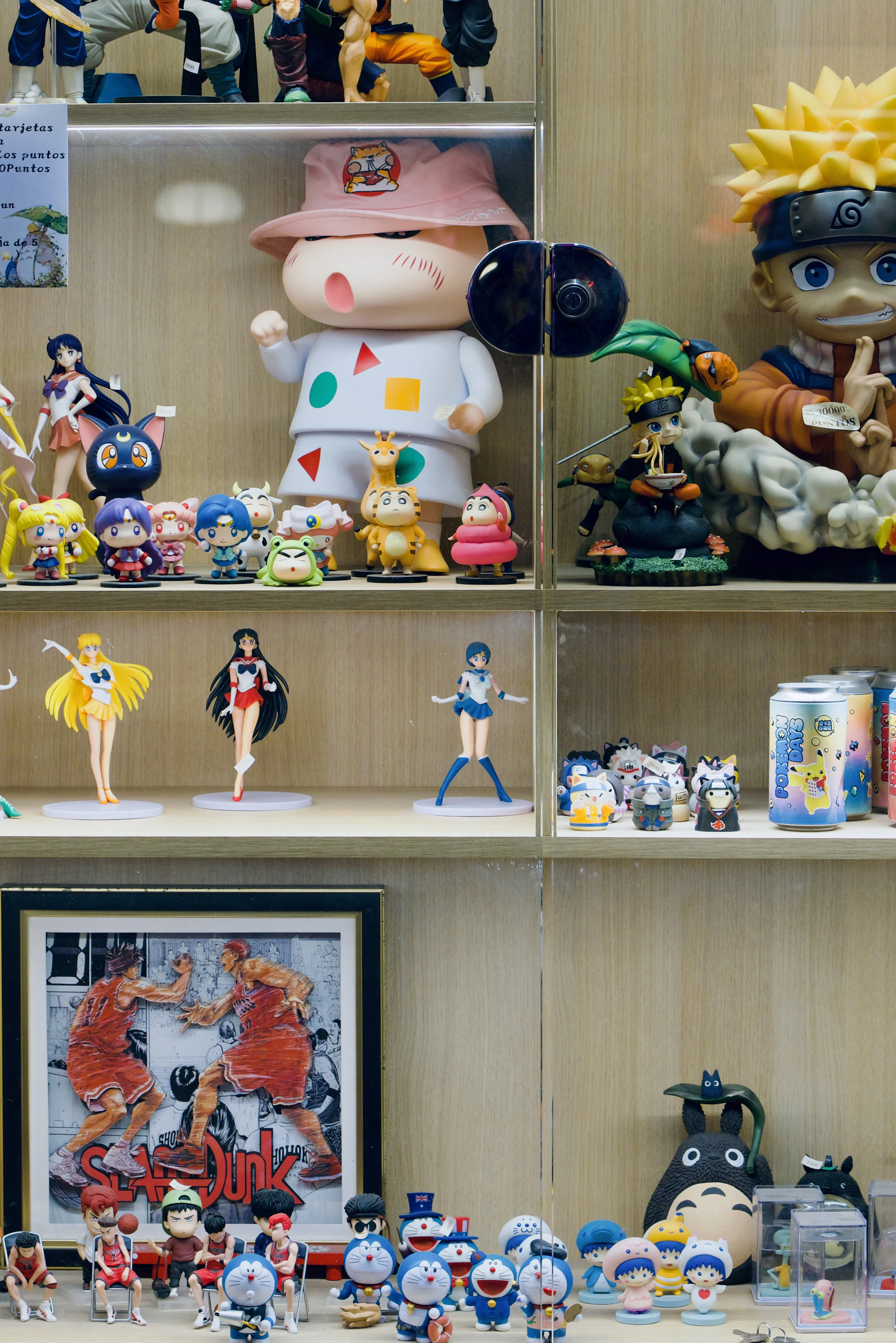 A display shelf filled with collectible figures and memorabilia