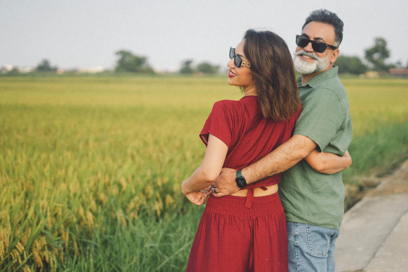 romantic couple embracing warmly at sunset