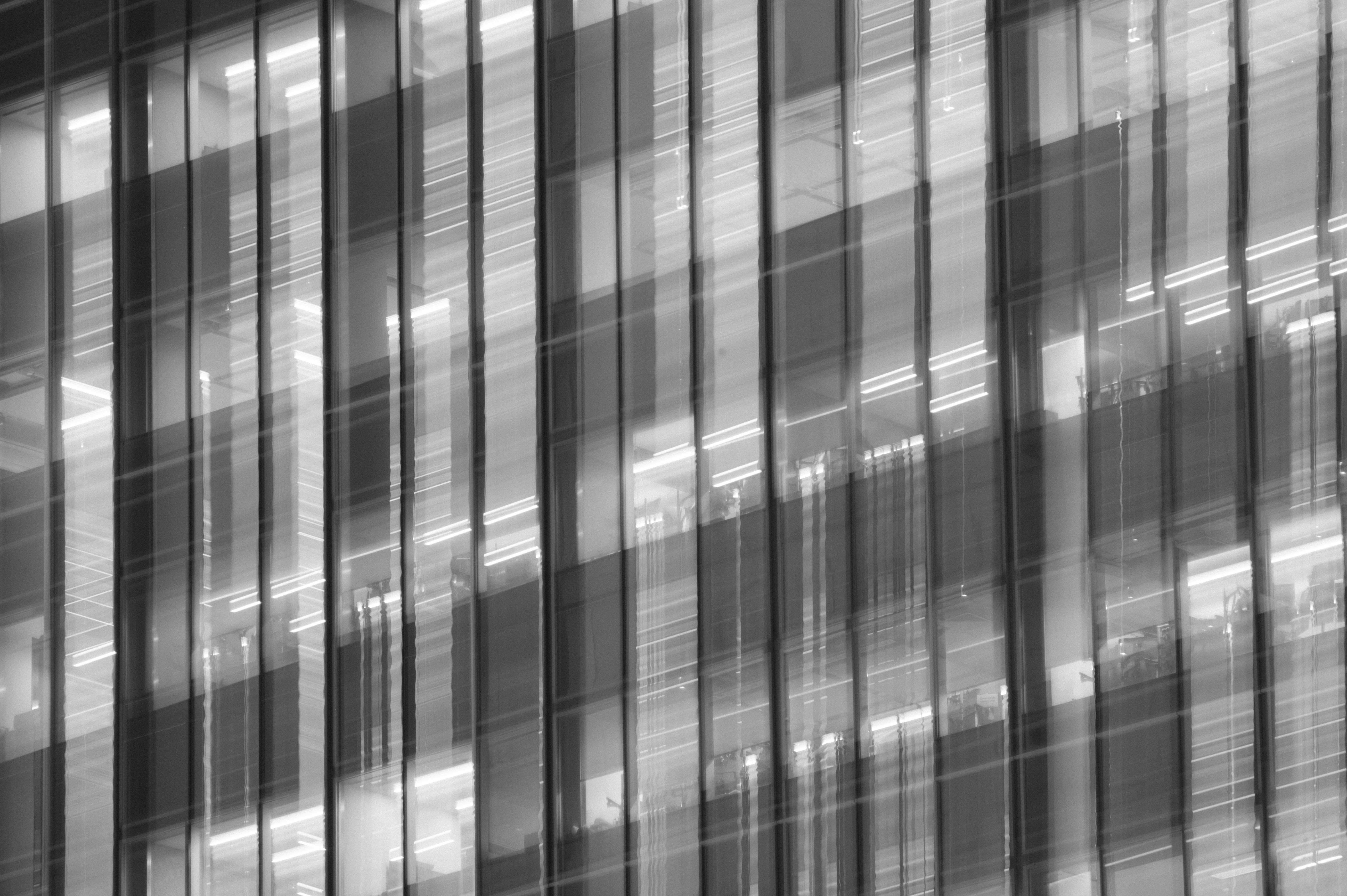Modern building facade with glass and shadows