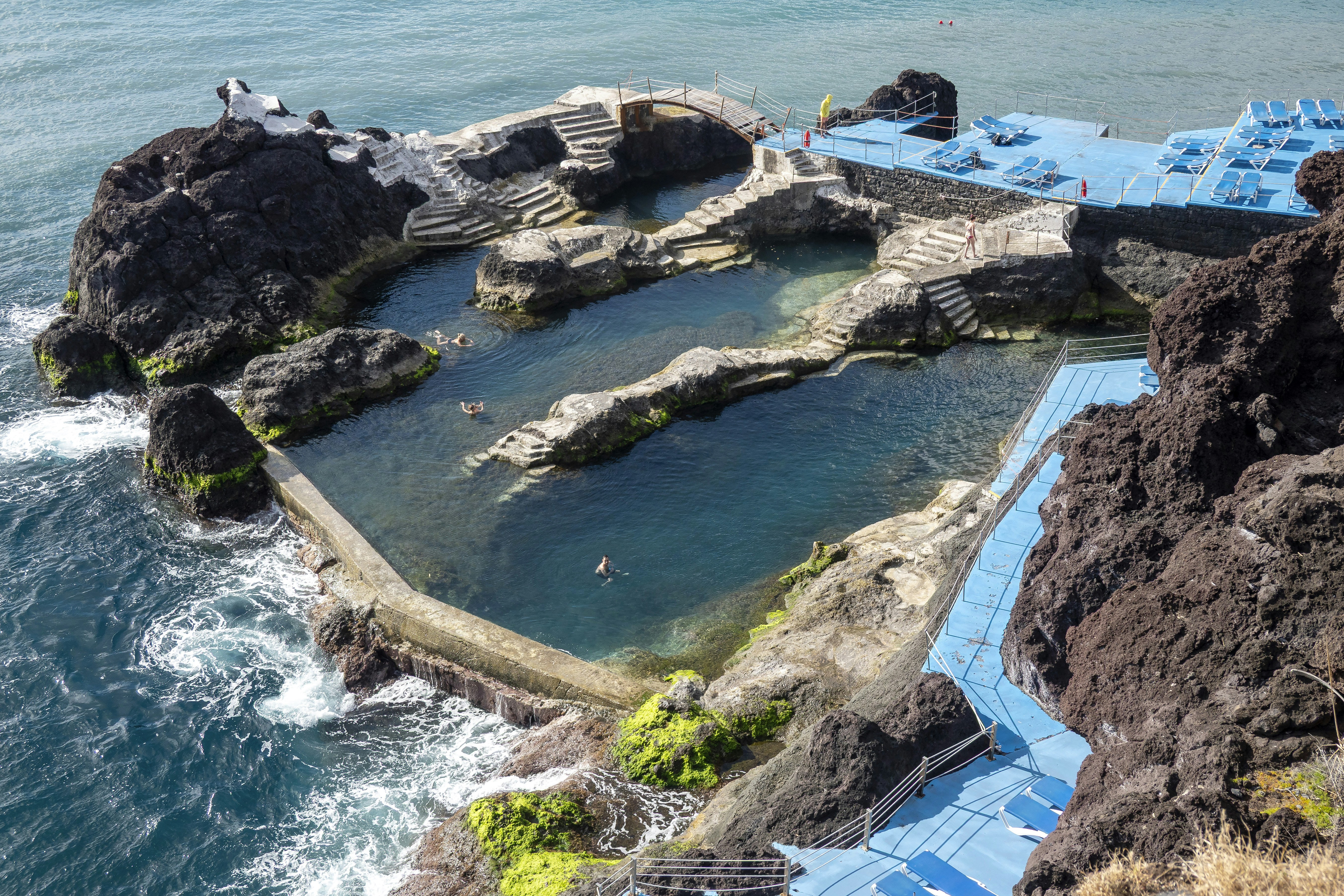 Natural ocean swimming pools carved into volcanic rock