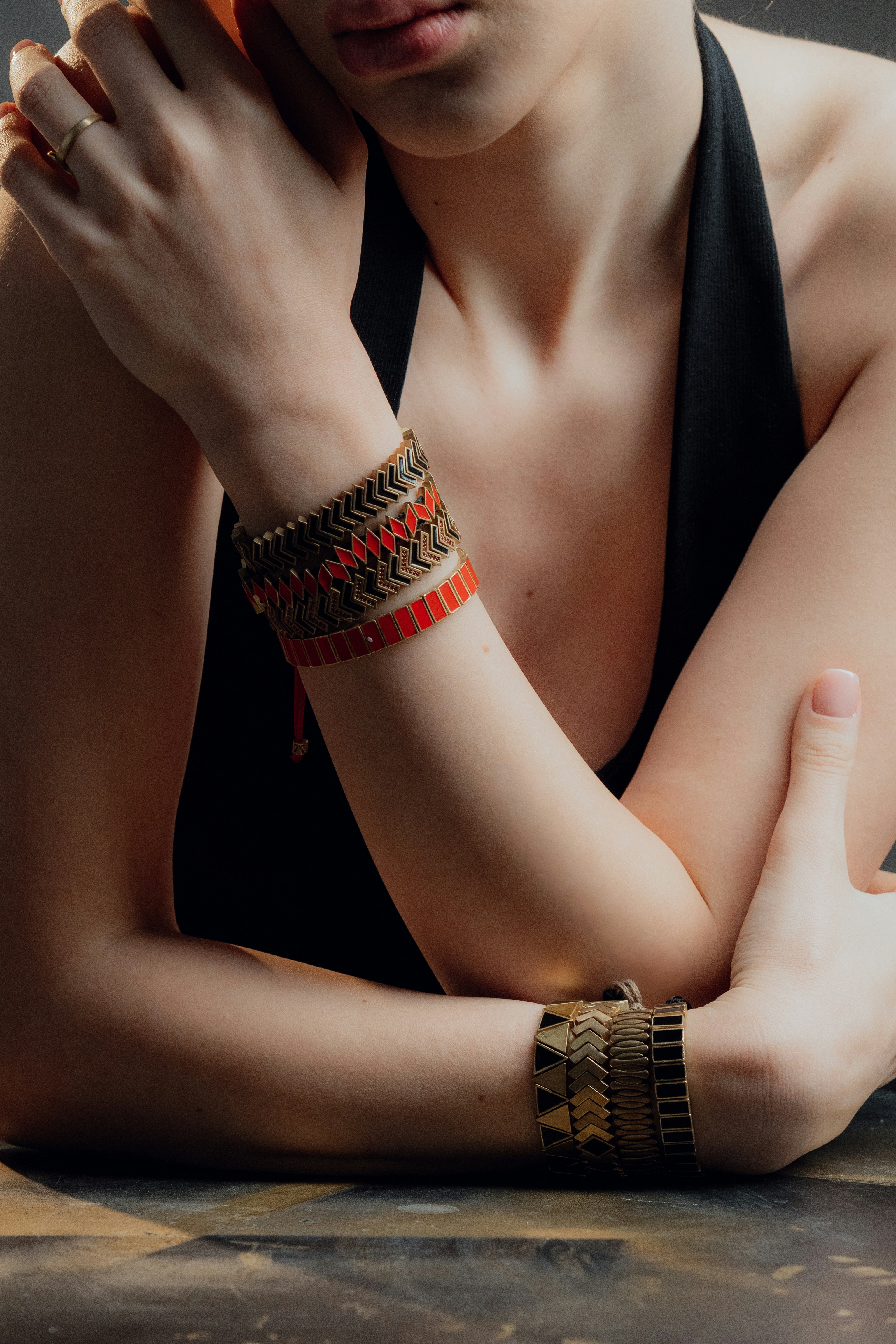 Woman with beaded bracelets on her arms