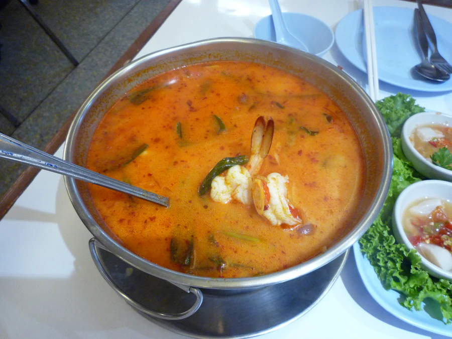 Spicy shrimp soup with herbs and vegetables