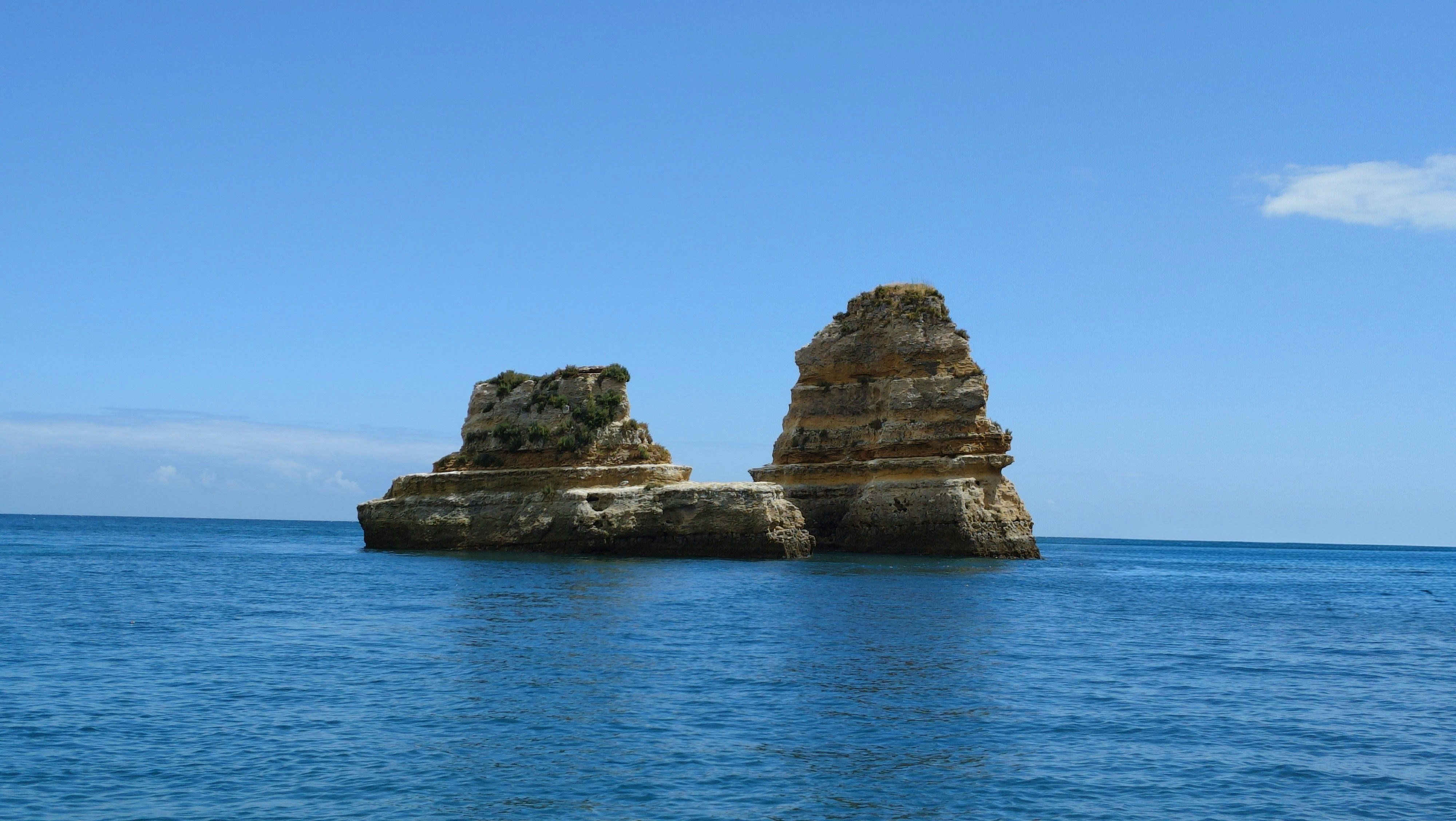 Two rocky islands in the blue ocean