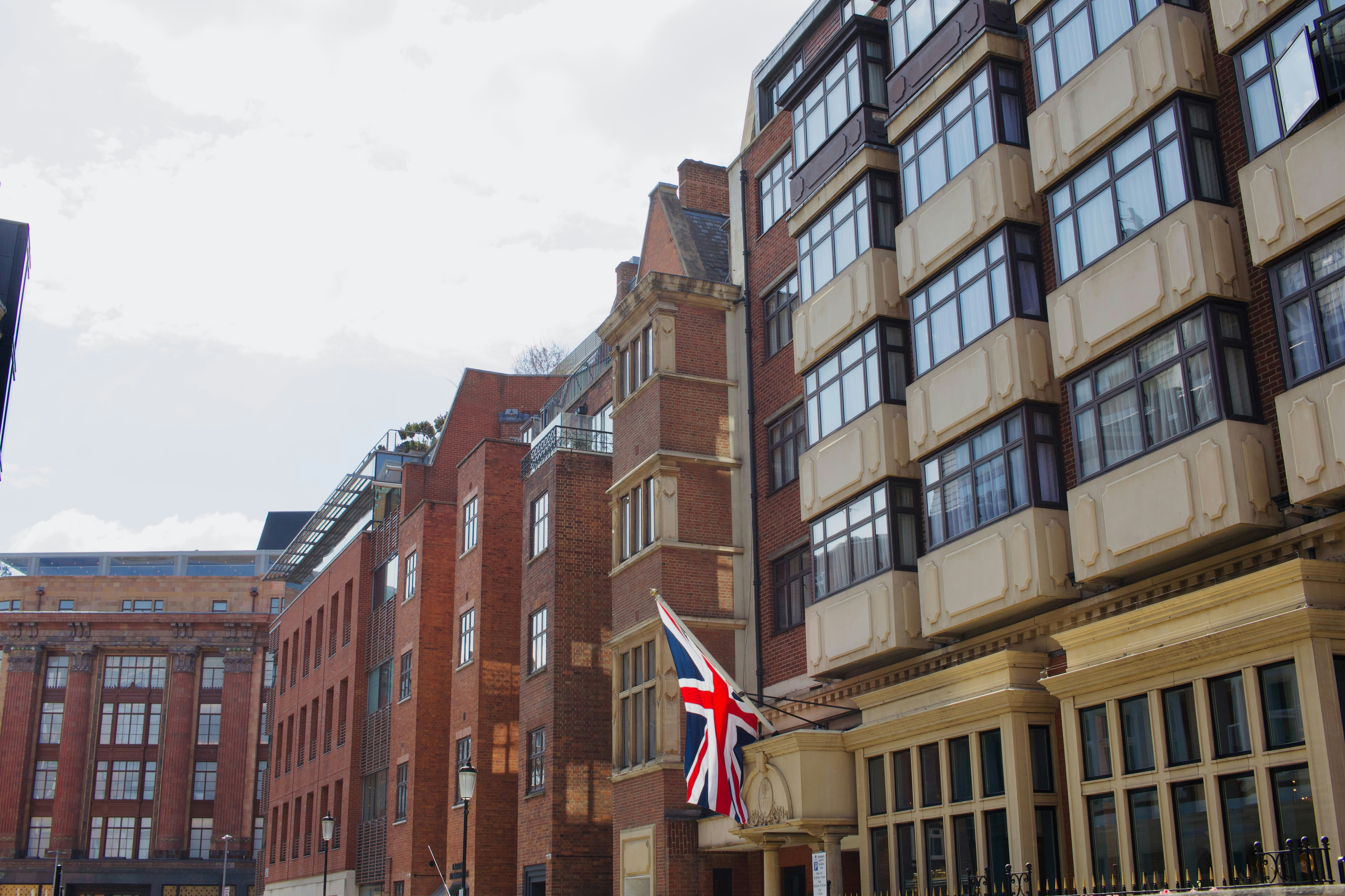 Brick buildings with a union jack flag displayed.