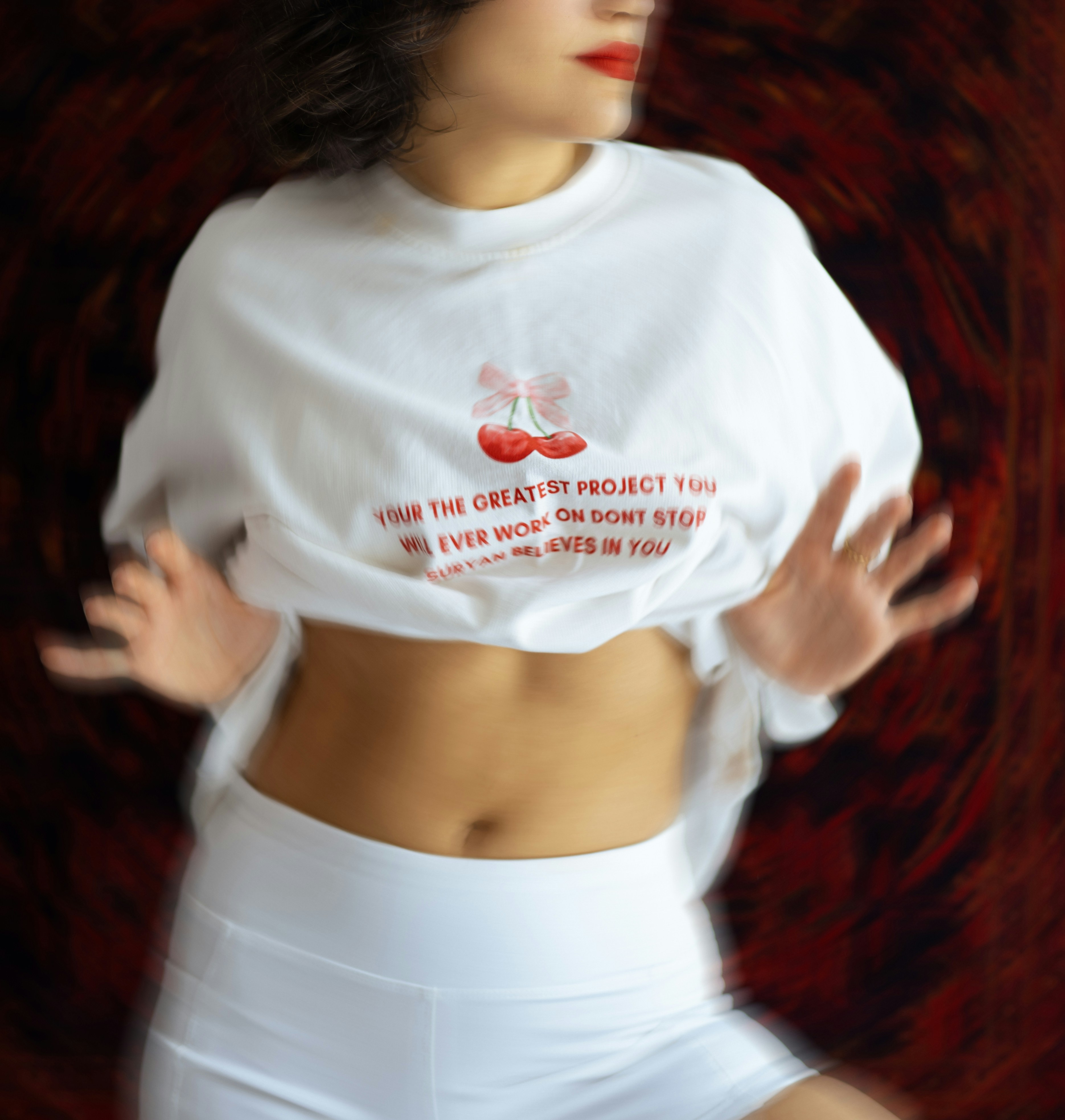 Woman in white shirt and shorts with text. - 相关推荐
