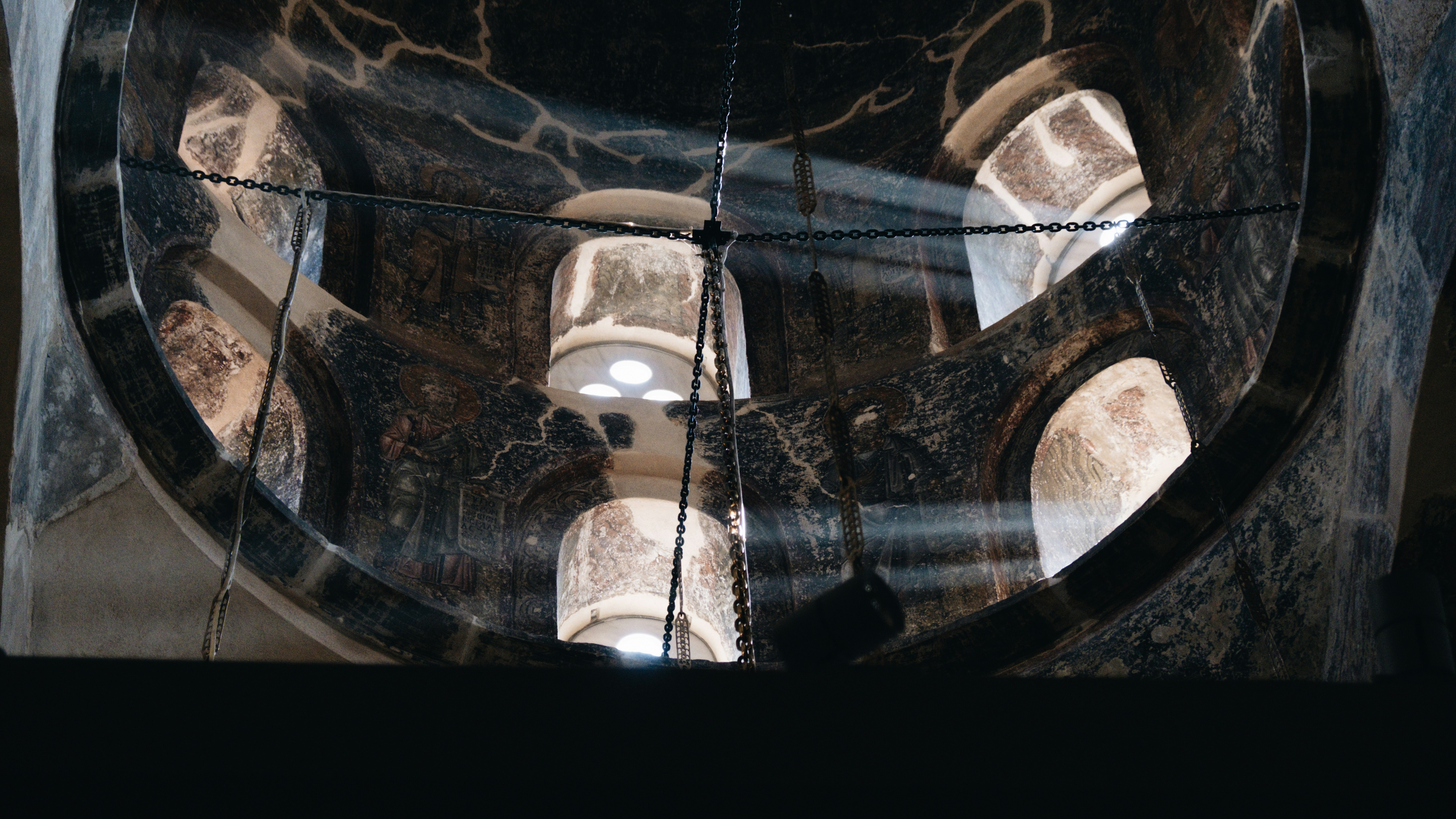 Arched windows with interior lights visible