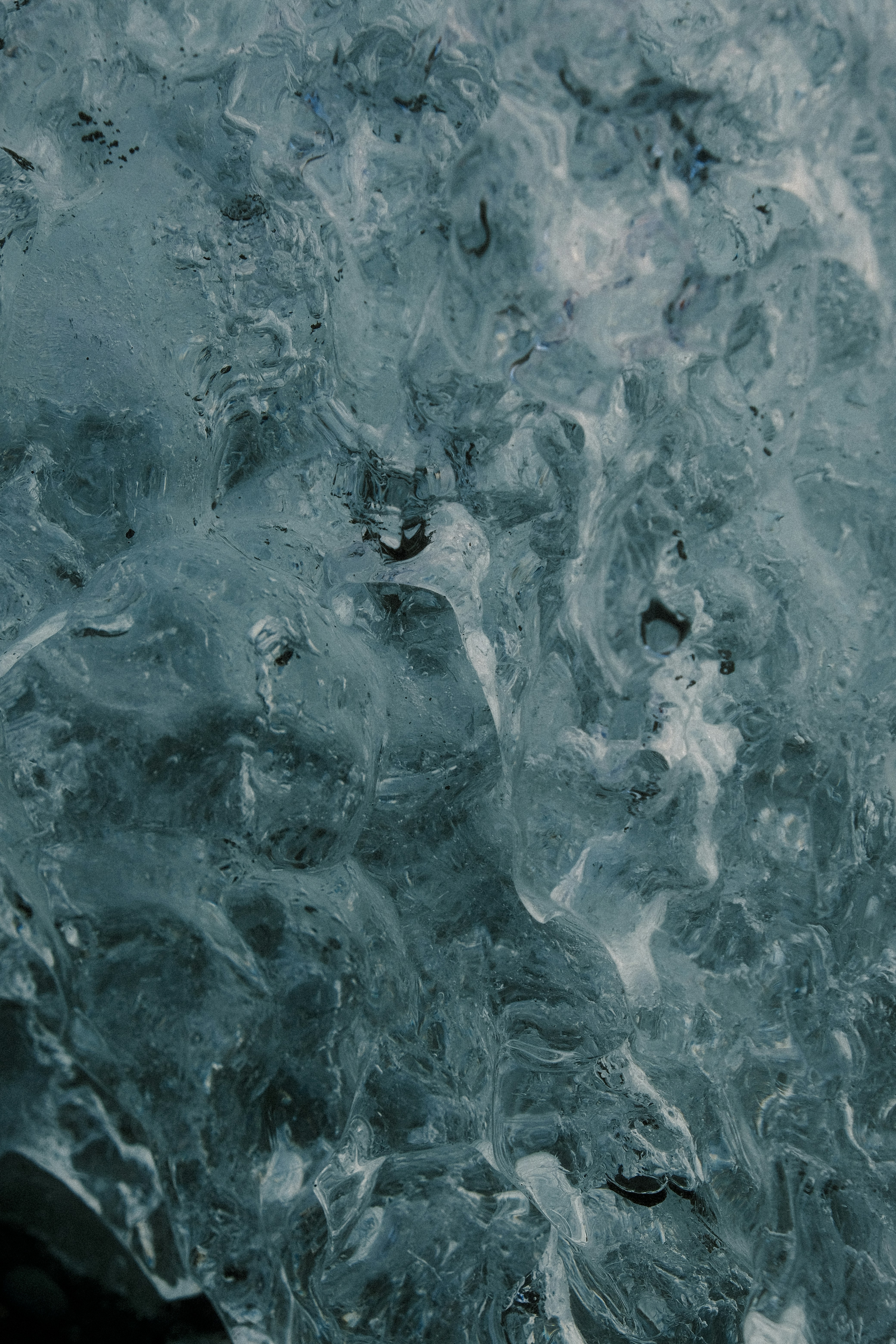 Close up of textured ice with swirling patterns