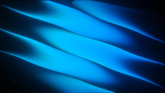 Abstract blue light streaks on a dark background