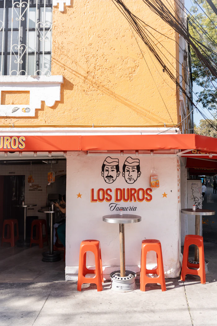 The storefront and counter stools