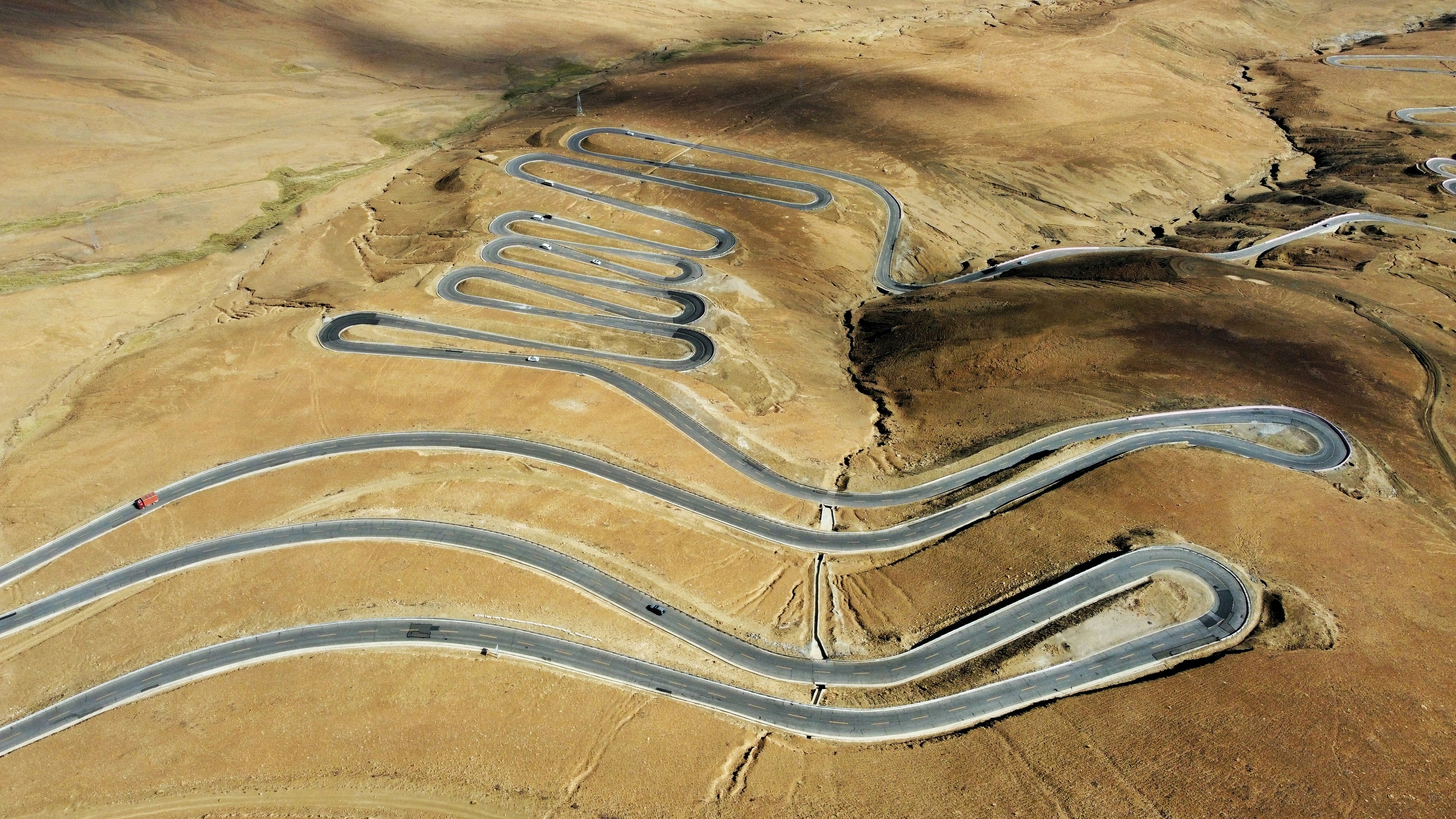 A winding mountain road with many switchbacks.