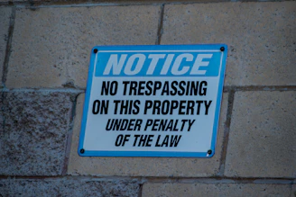 Notice no trespassing on this property sign