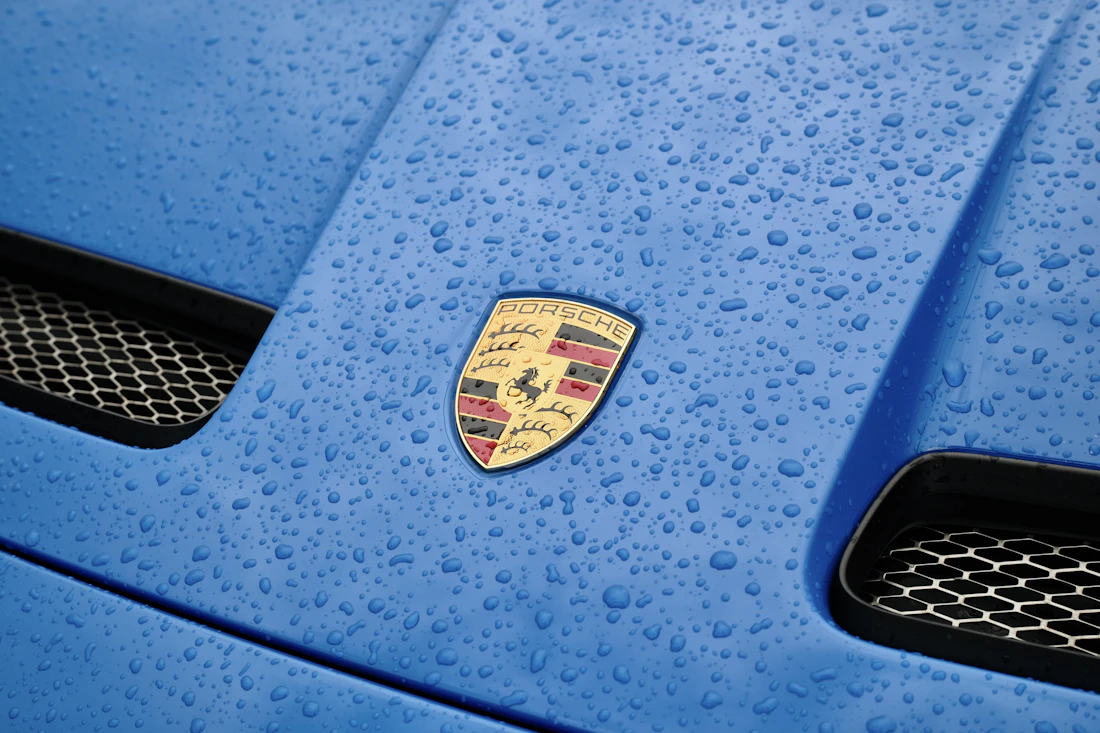 Water beading on a freshly ceramic coated car hood
