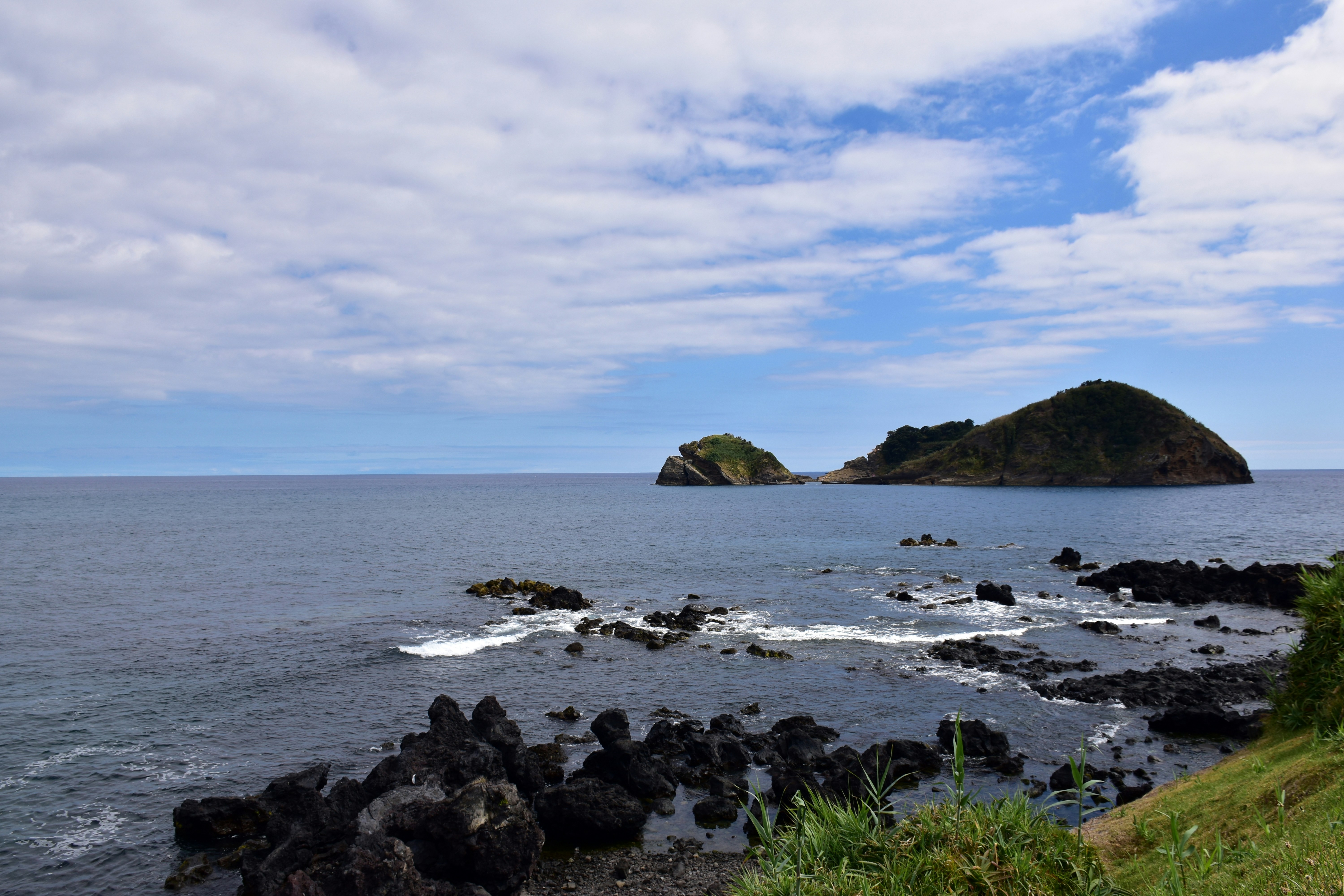 Rocky coastline with islands in the distance
