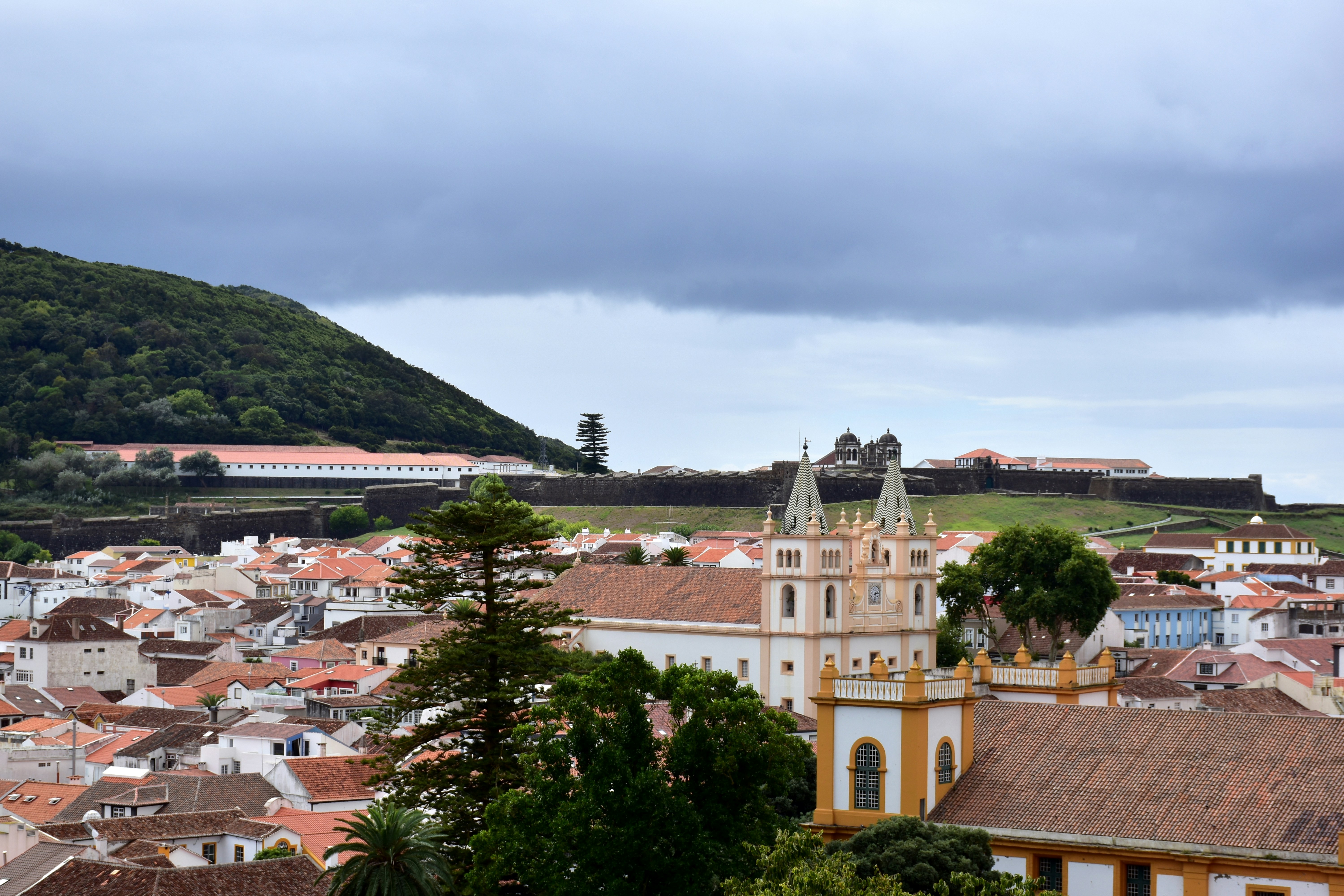A historic town with a prominent church and fort