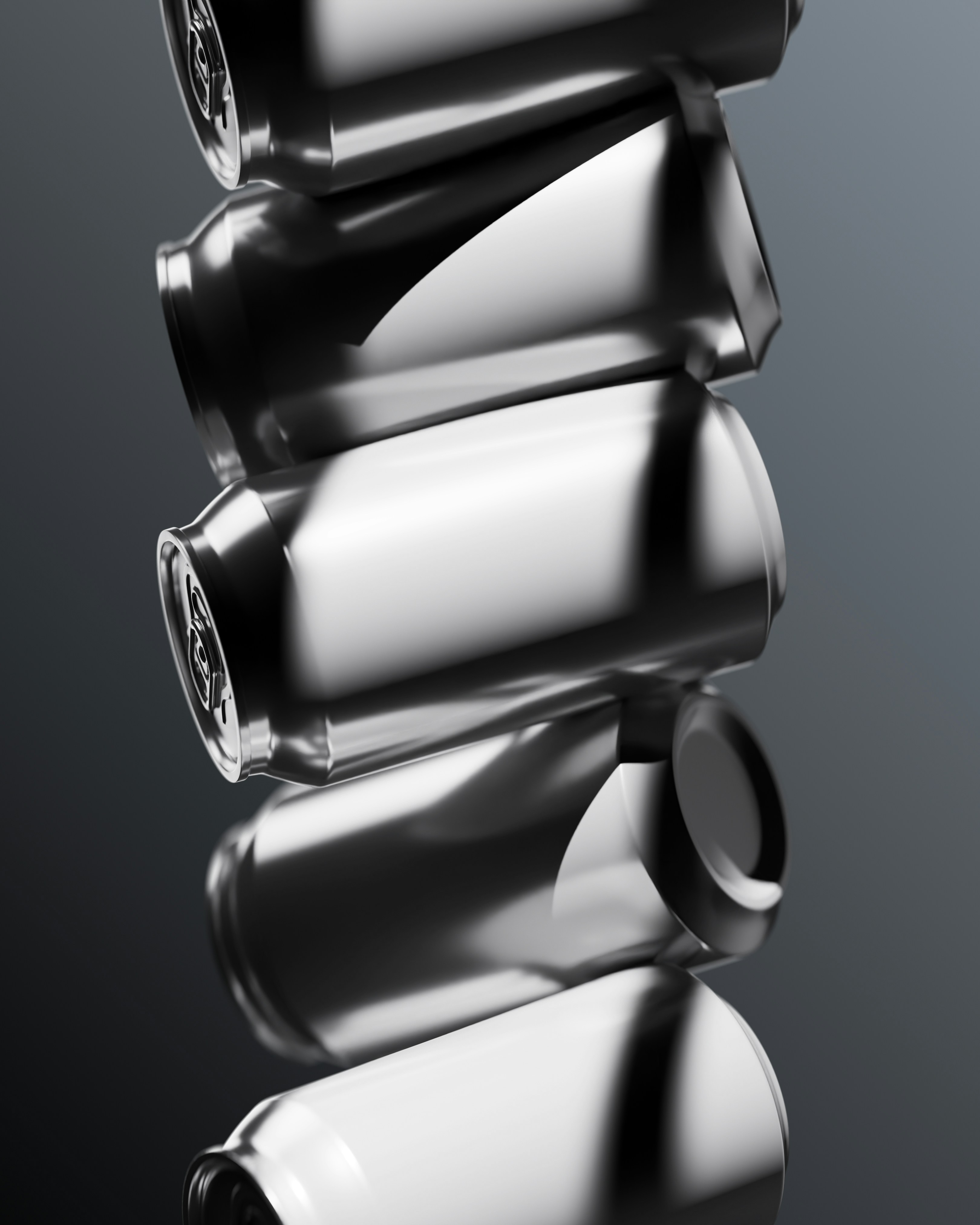 Stack of shiny aluminum cans on a gray background