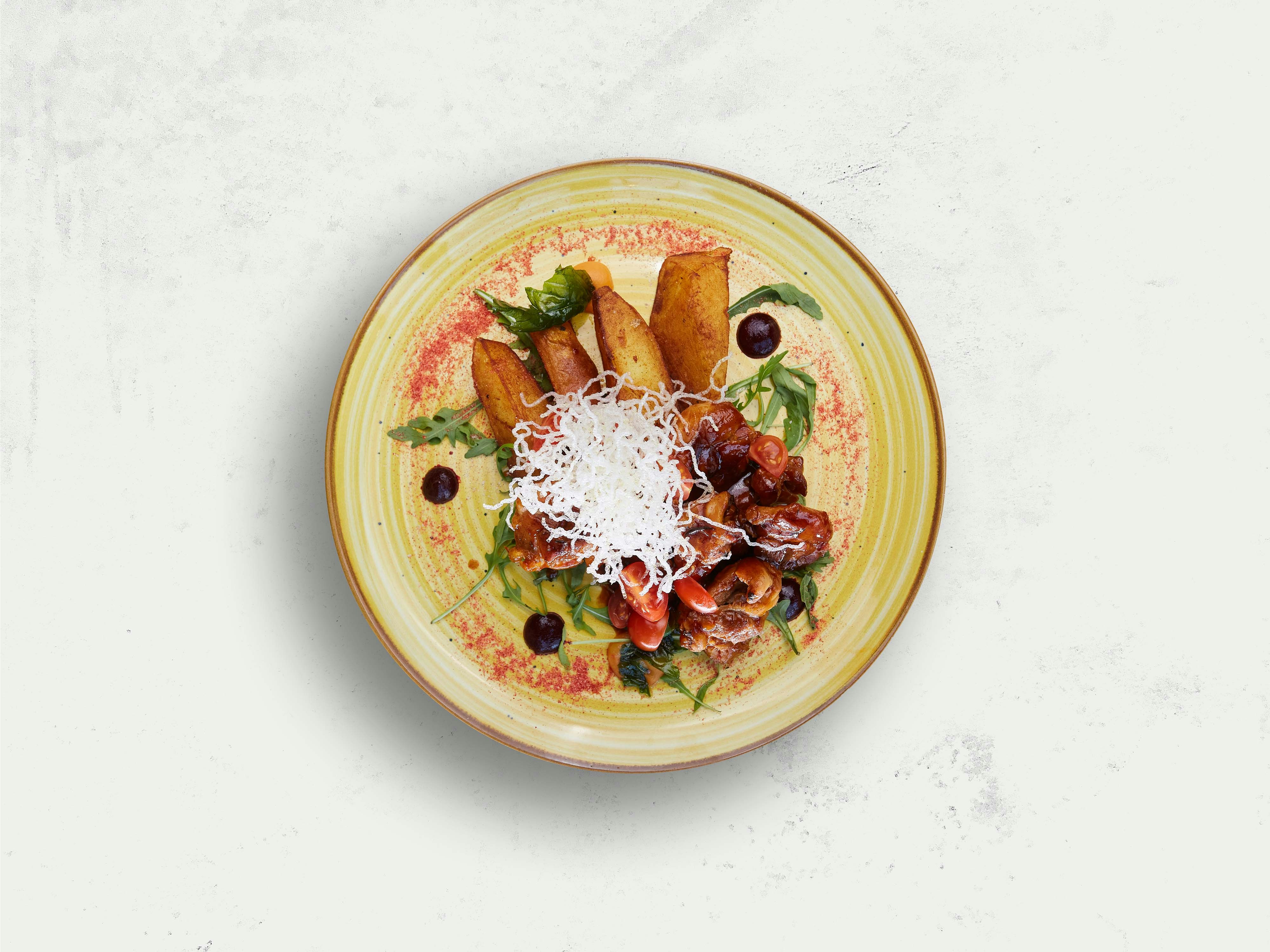 Gourmet dish with roasted potatoes