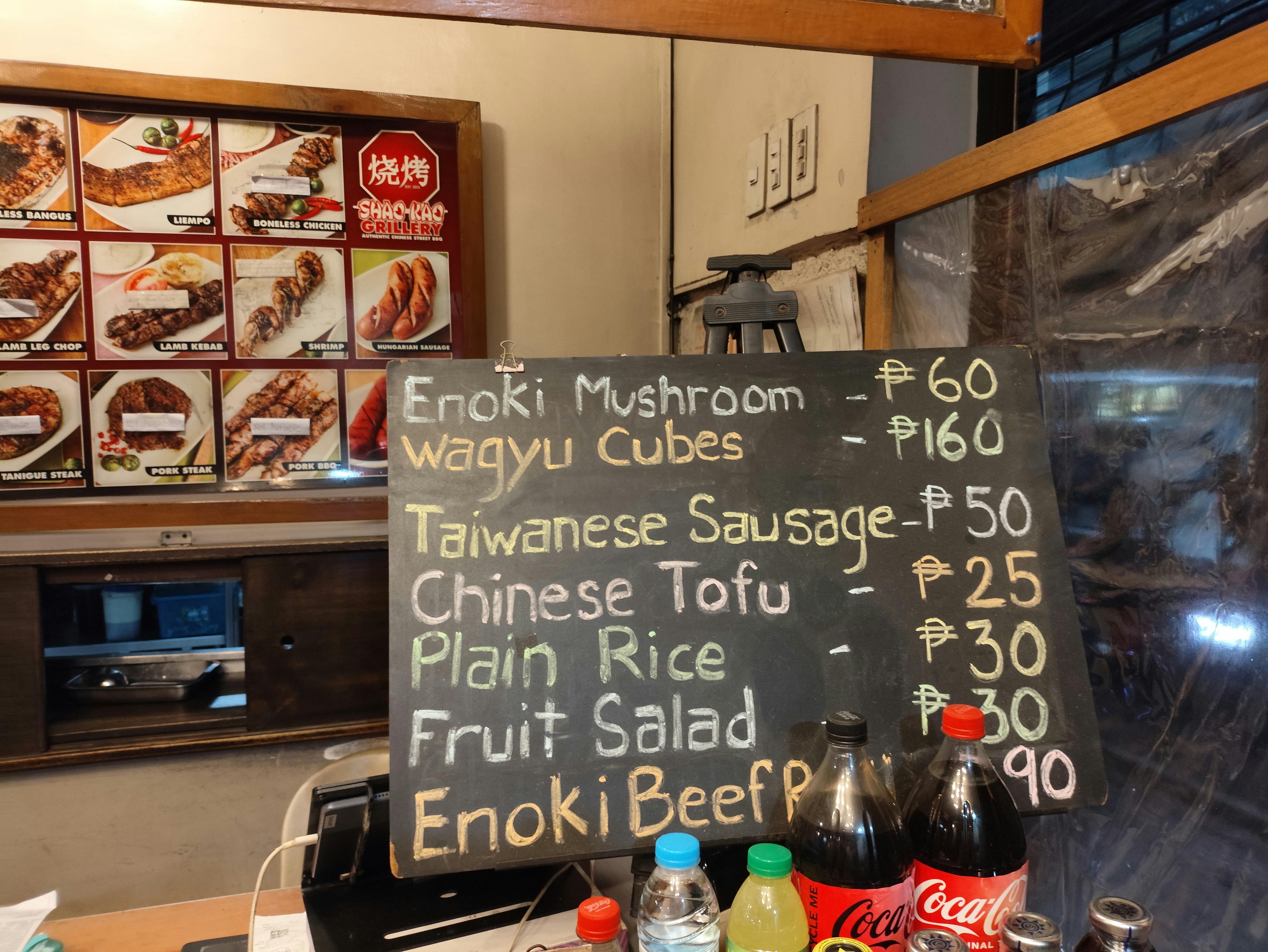 Menu board with food items and prices