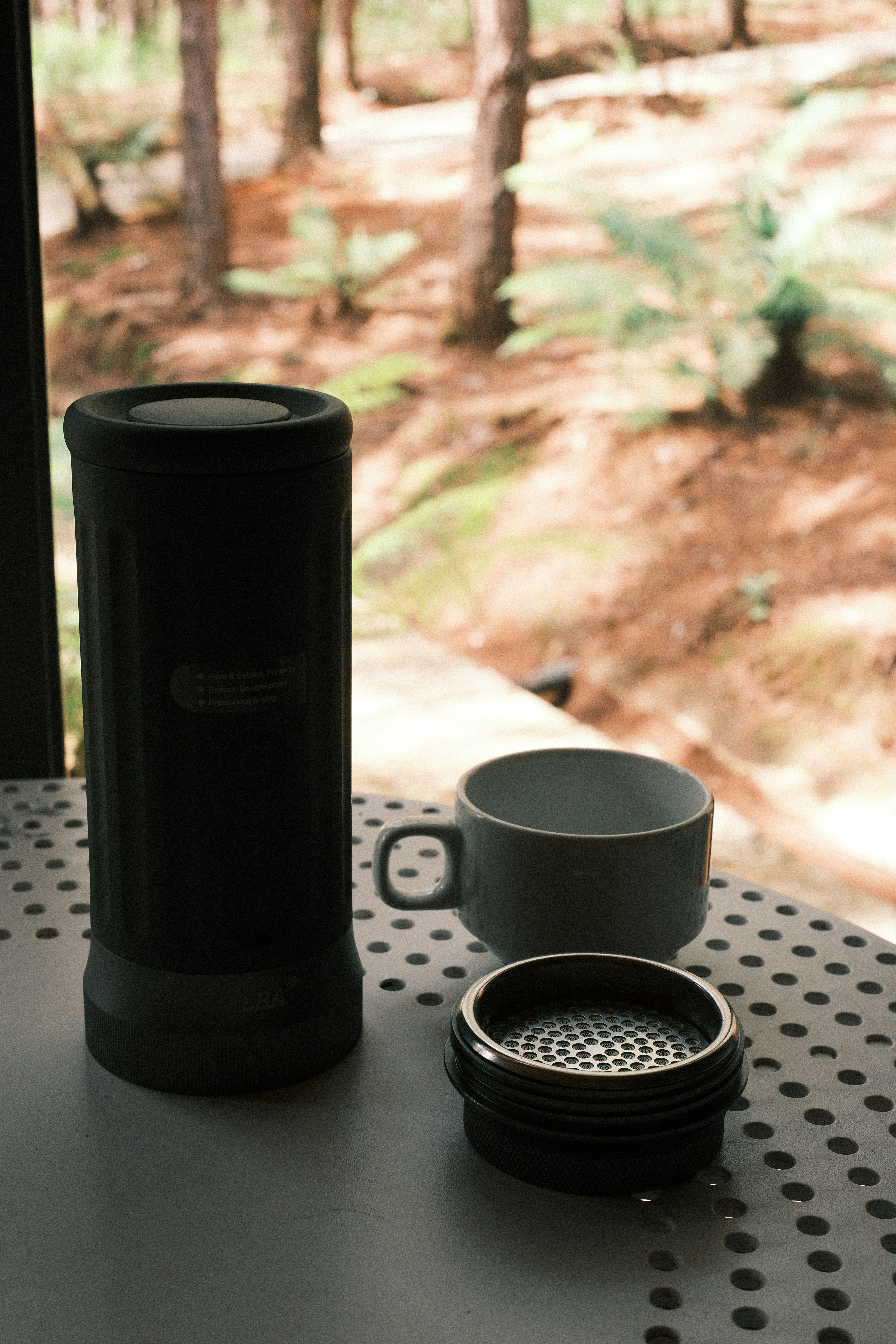 Portable espresso maker with cup and filter