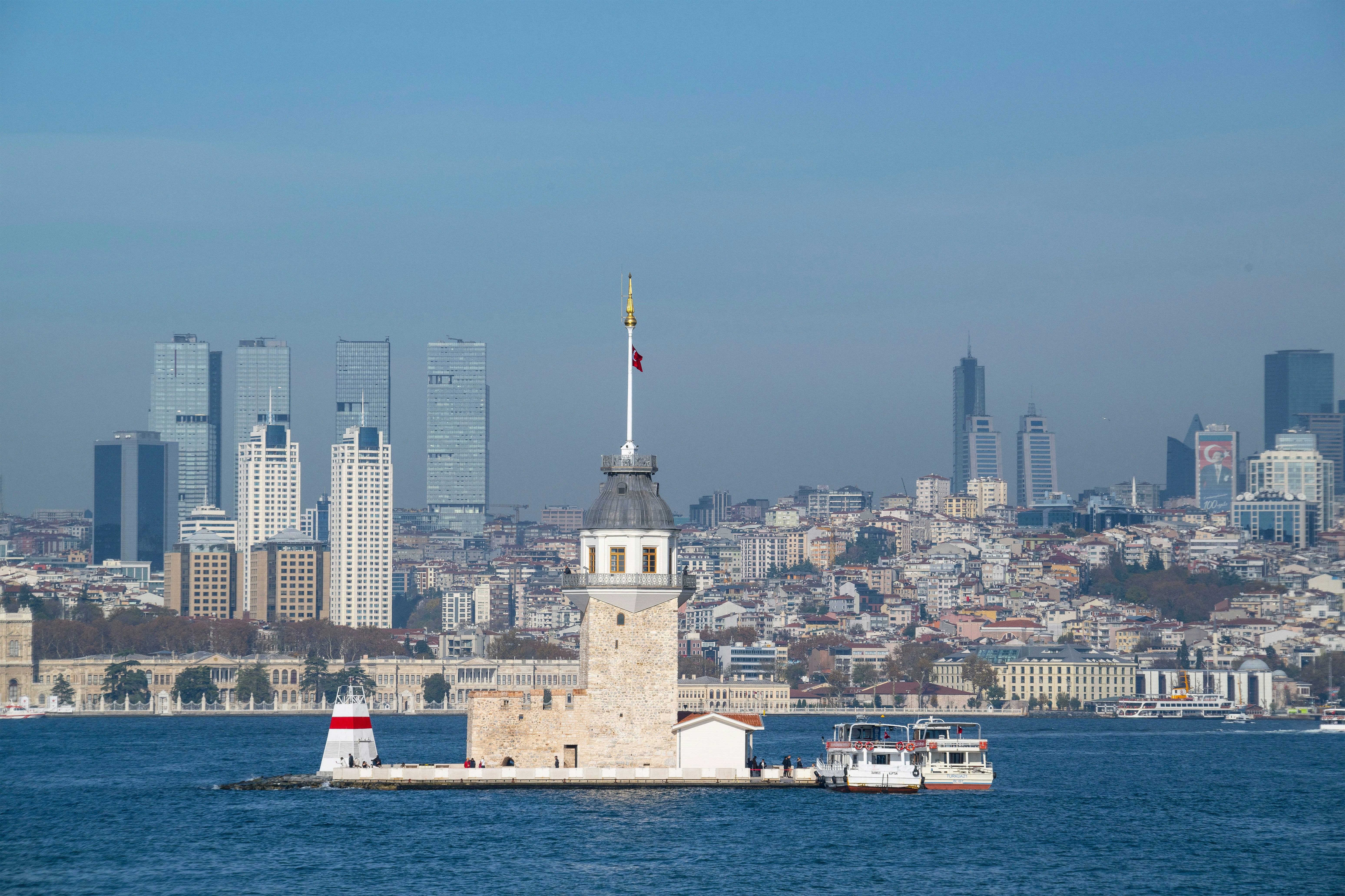 Maiden's tower in istanbul with modern skyline background