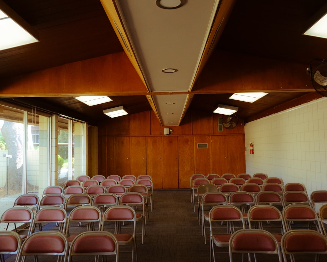 support group meeting circle of chairs in community room