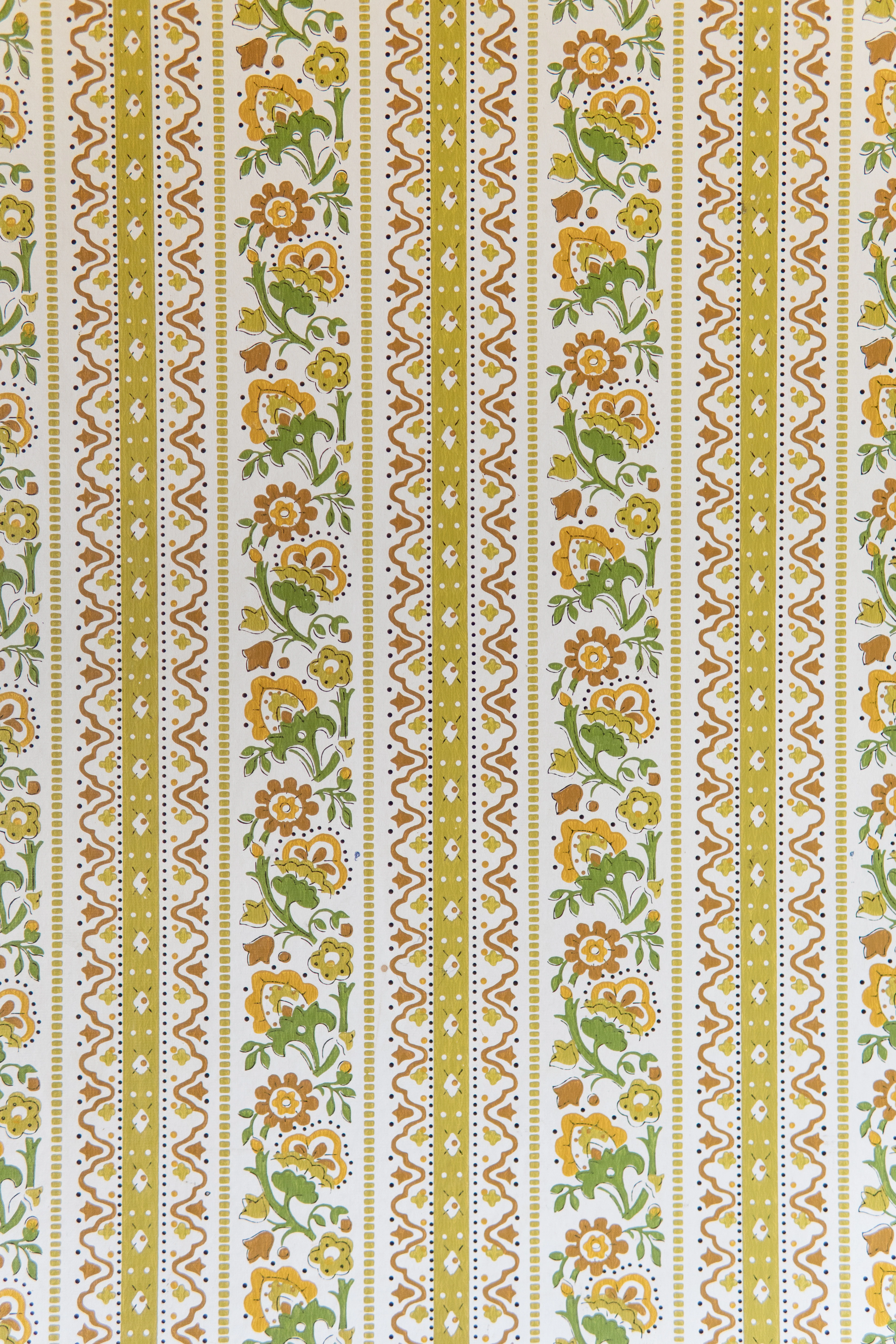 Floral striped wallpaper in green and orange