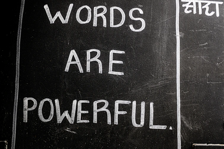 Words are powerful written on a blackboard