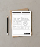A blank form with a pencil on a notebook