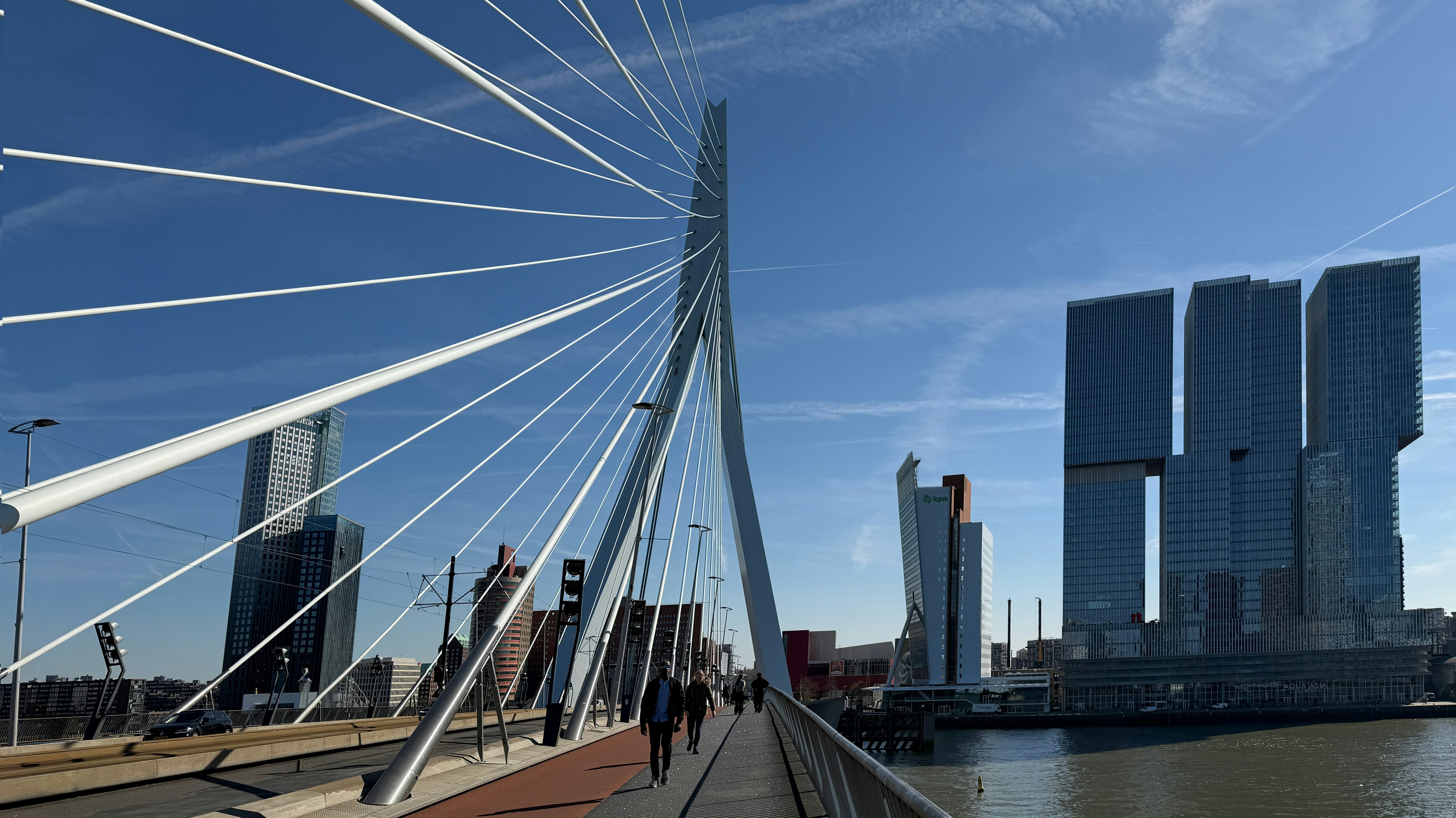 Modern bridge with skyscrapers and blue sky