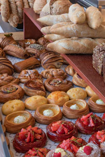 Assortment of fresh pastries and breads on display