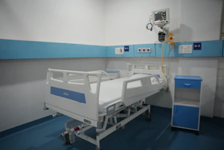 A modern hospital room with an adjustable bed.