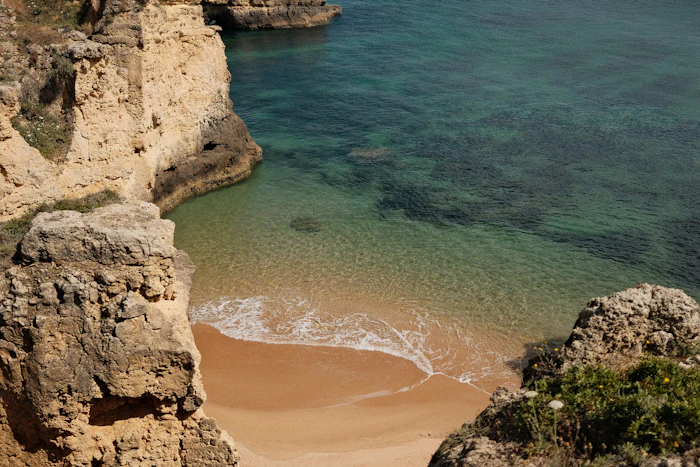 Secluded sandy cove with calm turquoise water, similar to Smith Cove near George Town