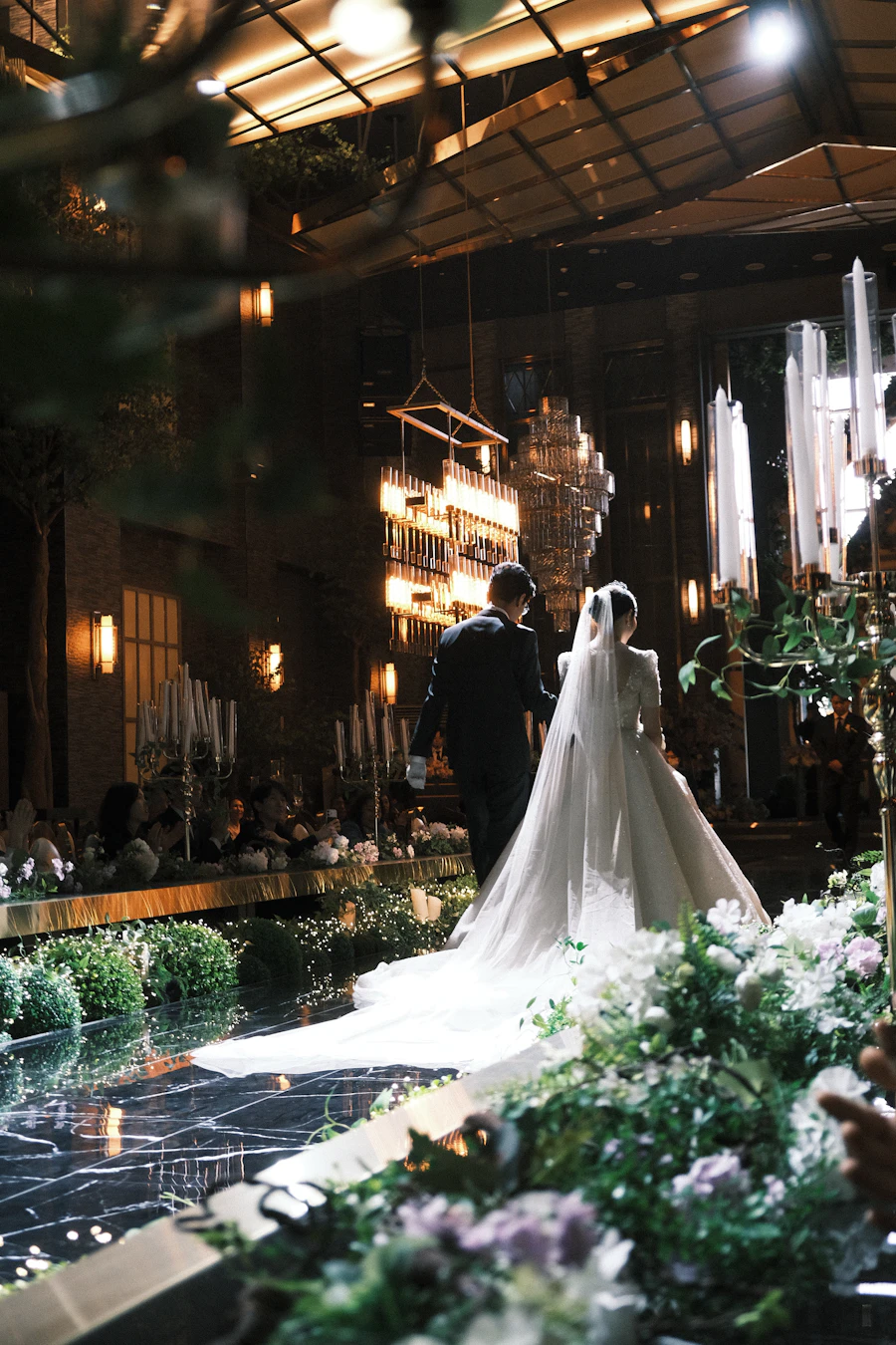 Bride and groom walking down aisle