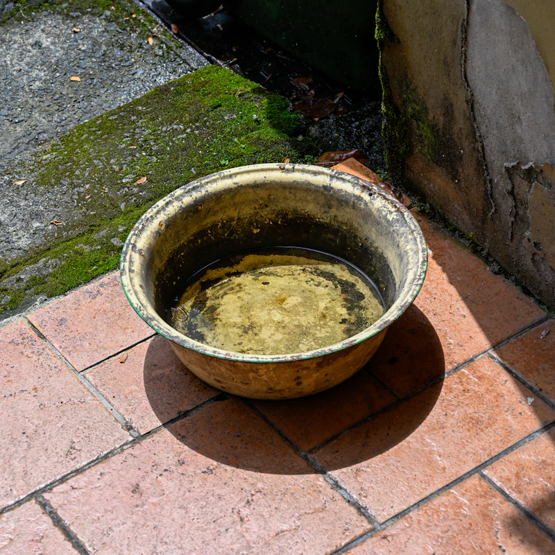 Turkish hammam with copper bowl and folded peştemal towel