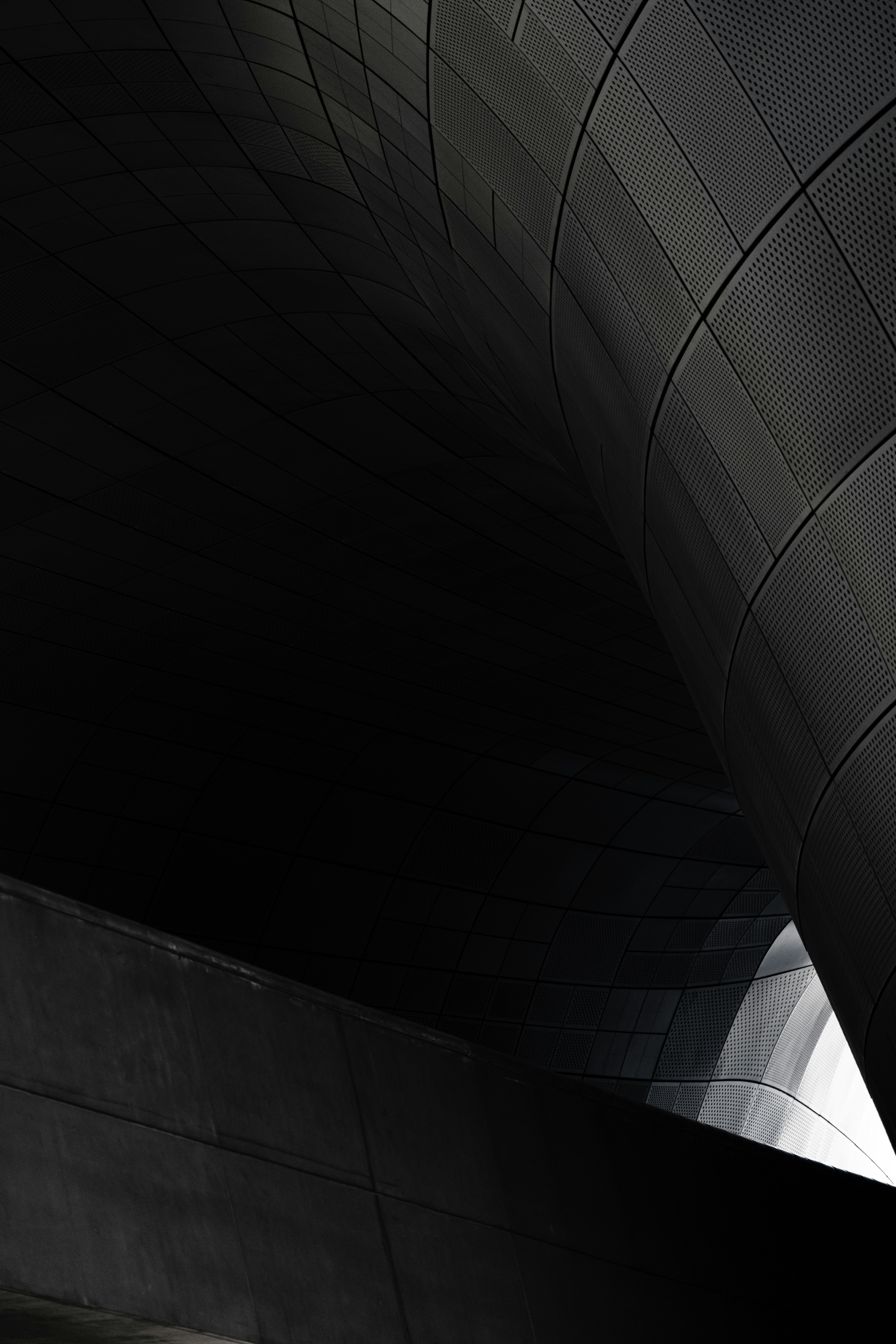 Dark abstract architectural curves with metallic texture