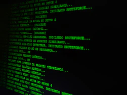 Green text displaying code on a dark computer screen