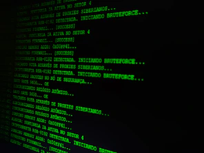 Green text displaying code on a dark computer screen