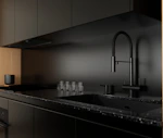 Modern black kitchen counter with sink and faucet
