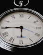 Close up of a vintage pocket watch face