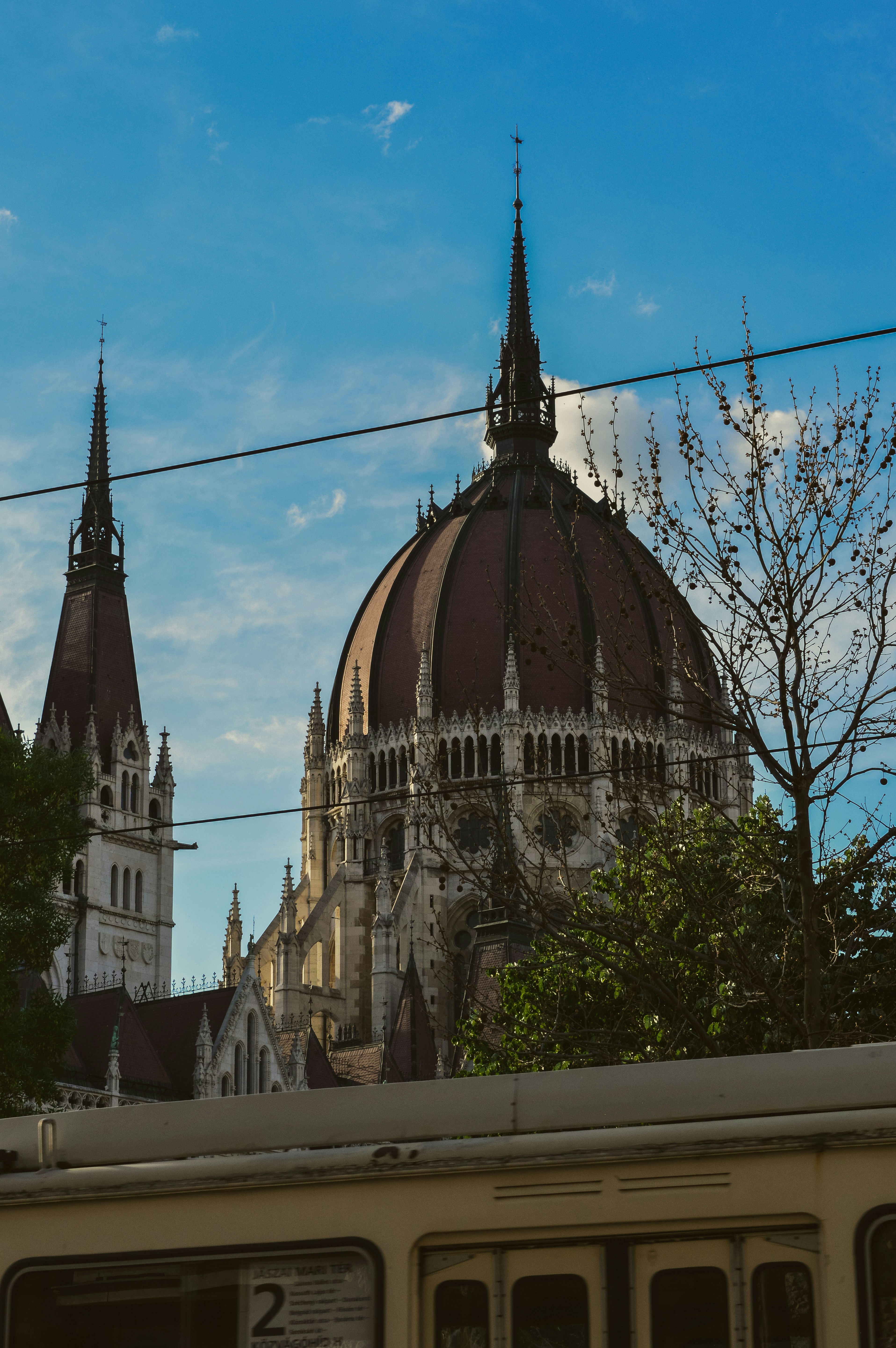 Ornate gothic building with a large dome and spire.