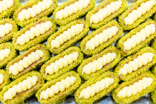 Pistachio pastries filled with cream