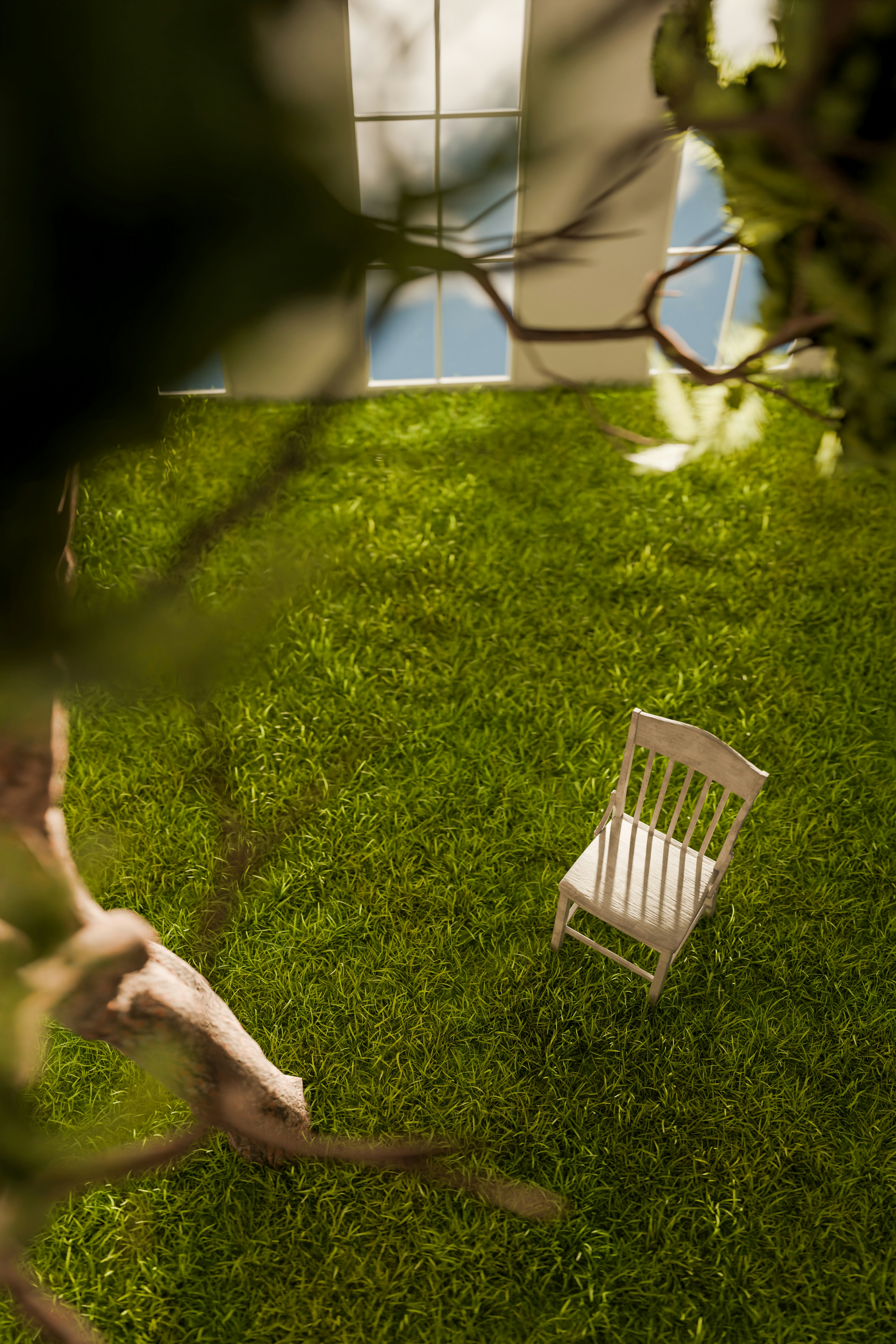 Empty chair on green grass with trees and building.