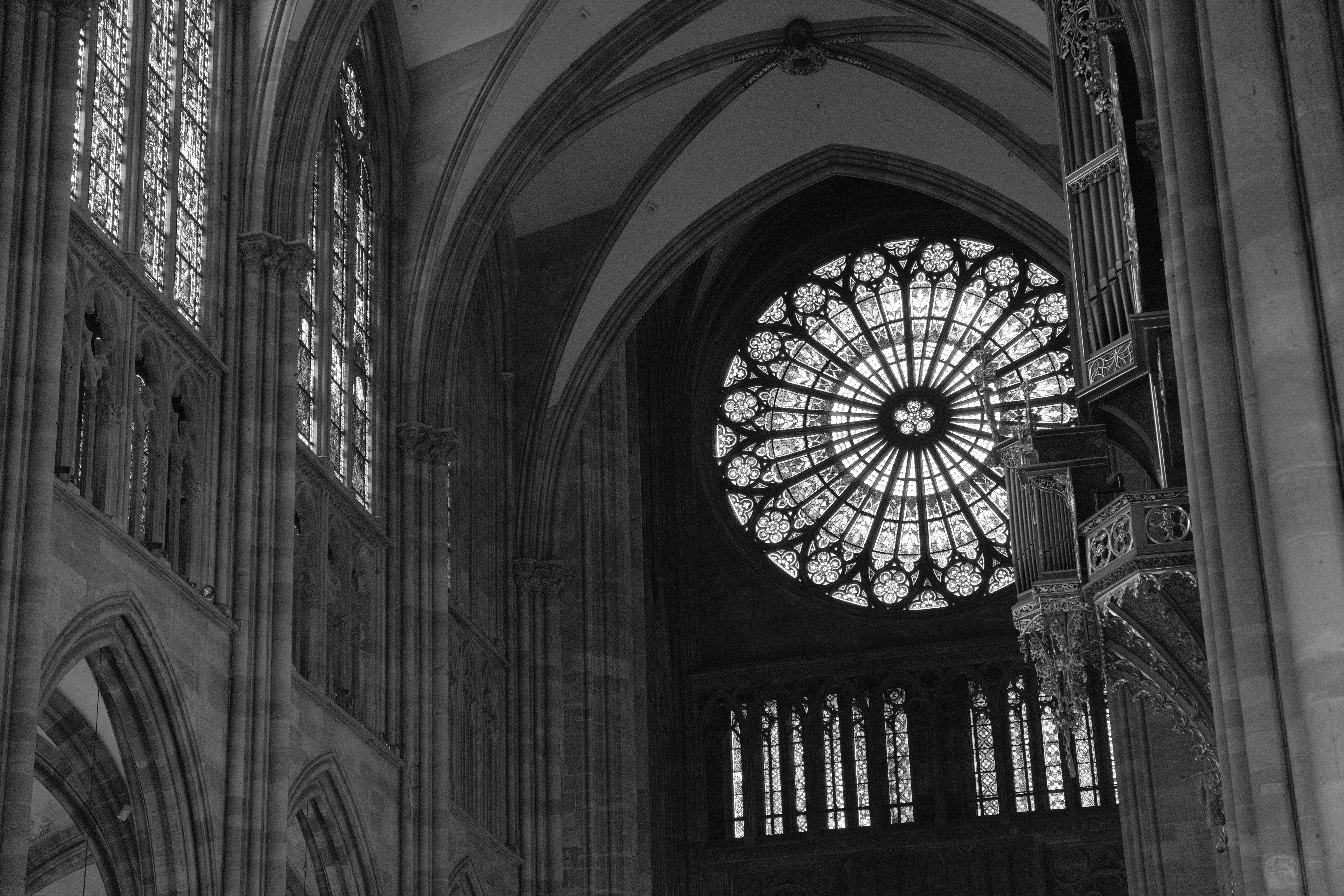 Ornate rose window inside a gothic cathedral
