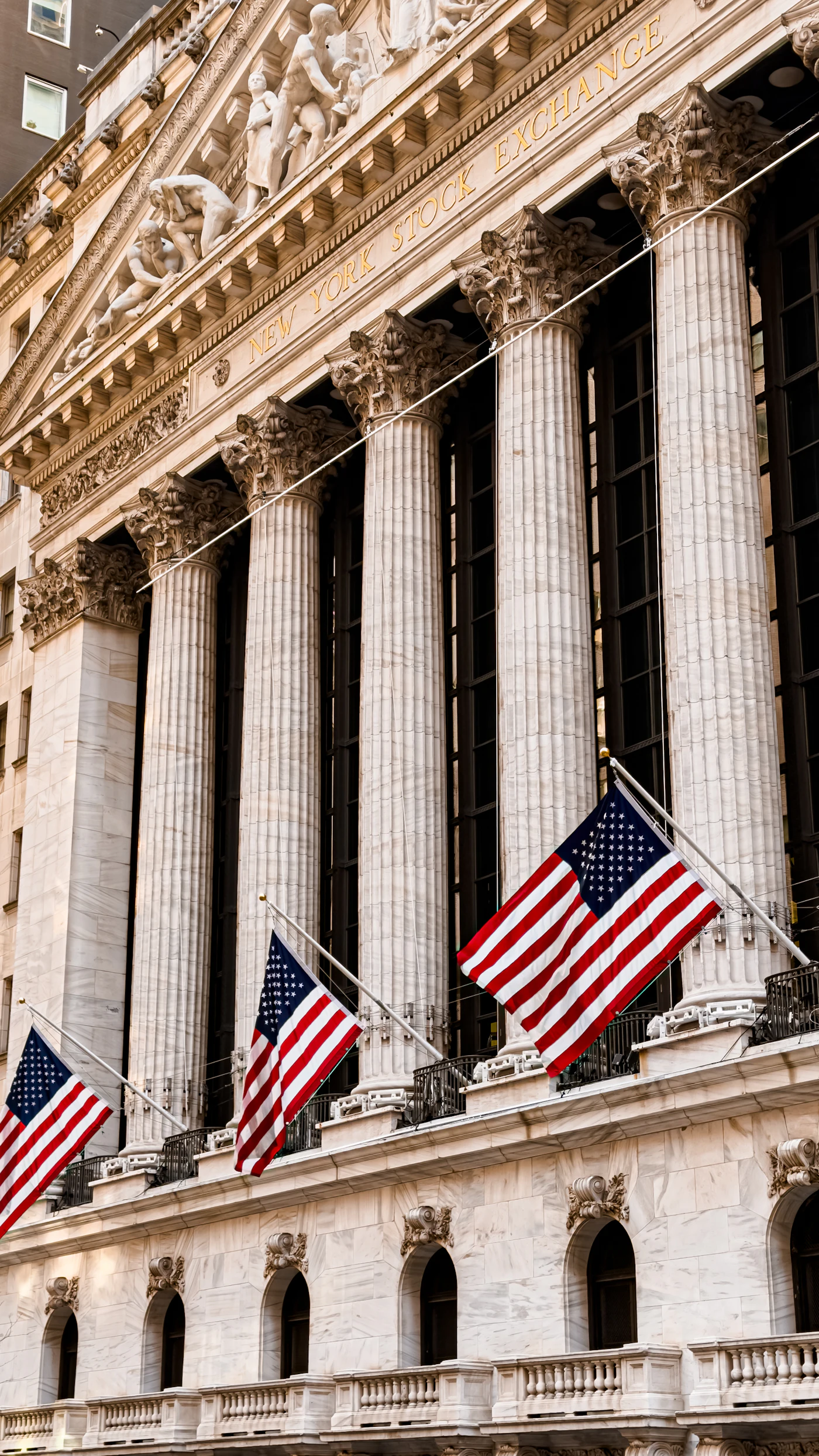 American flags fly outside the New York Stock Exchange building