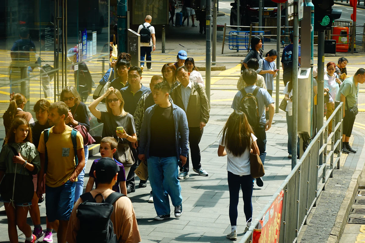 Busy city street crowd with people walking