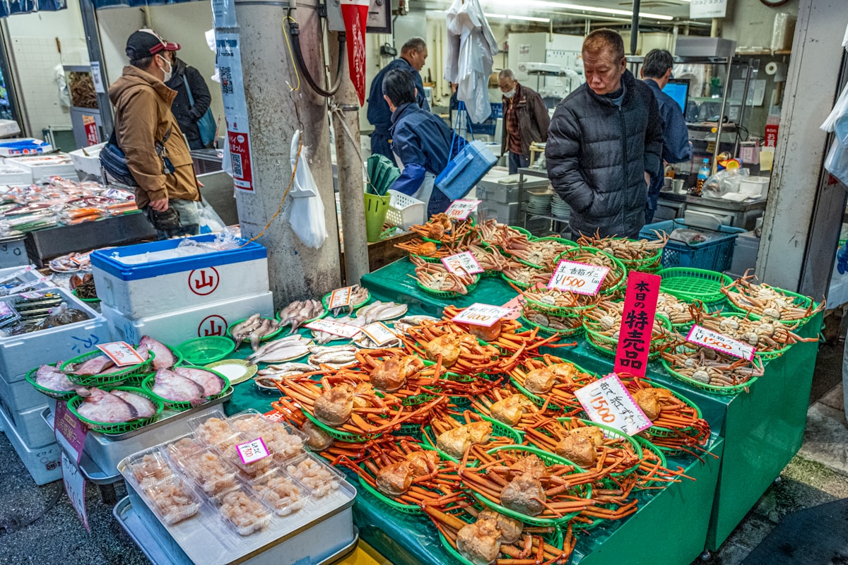 Omicho Market Kanazawa — fresh snow crabs on display at a fish stall in the covered market
