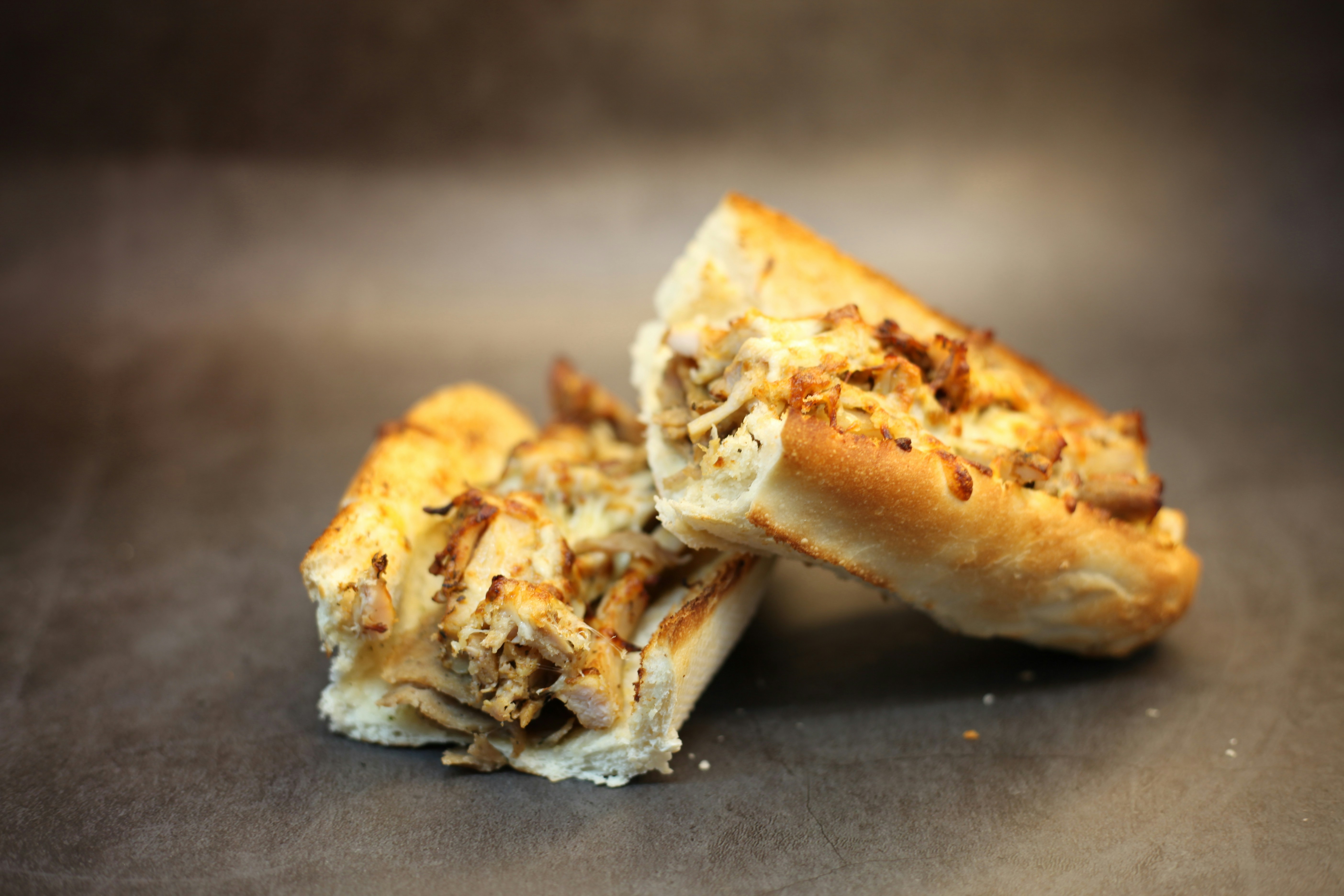Two halves of a delicious chicken sandwich